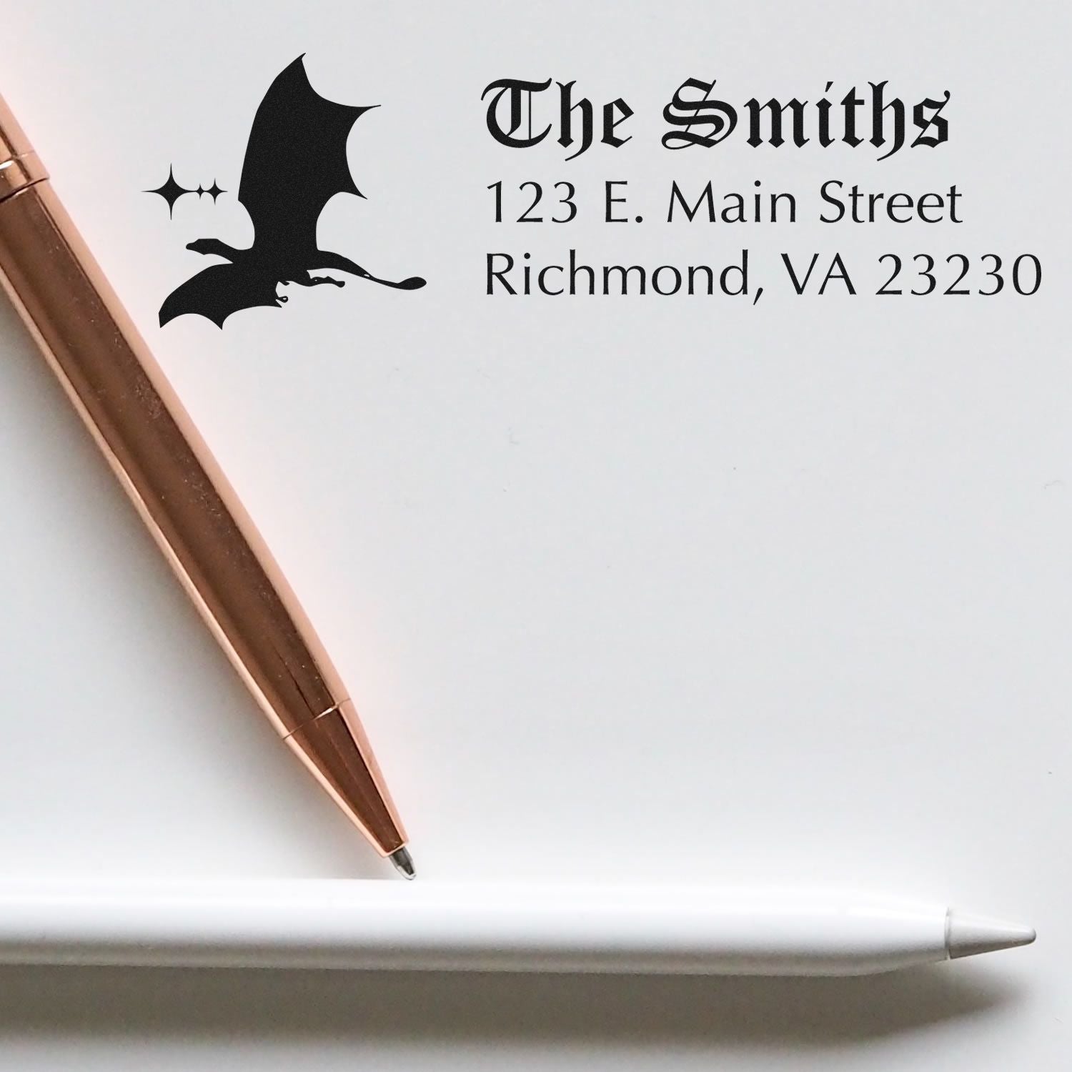 Personalized address rubber stamp with bat logo for The Smiths, showing name and Richmond, VA return address.