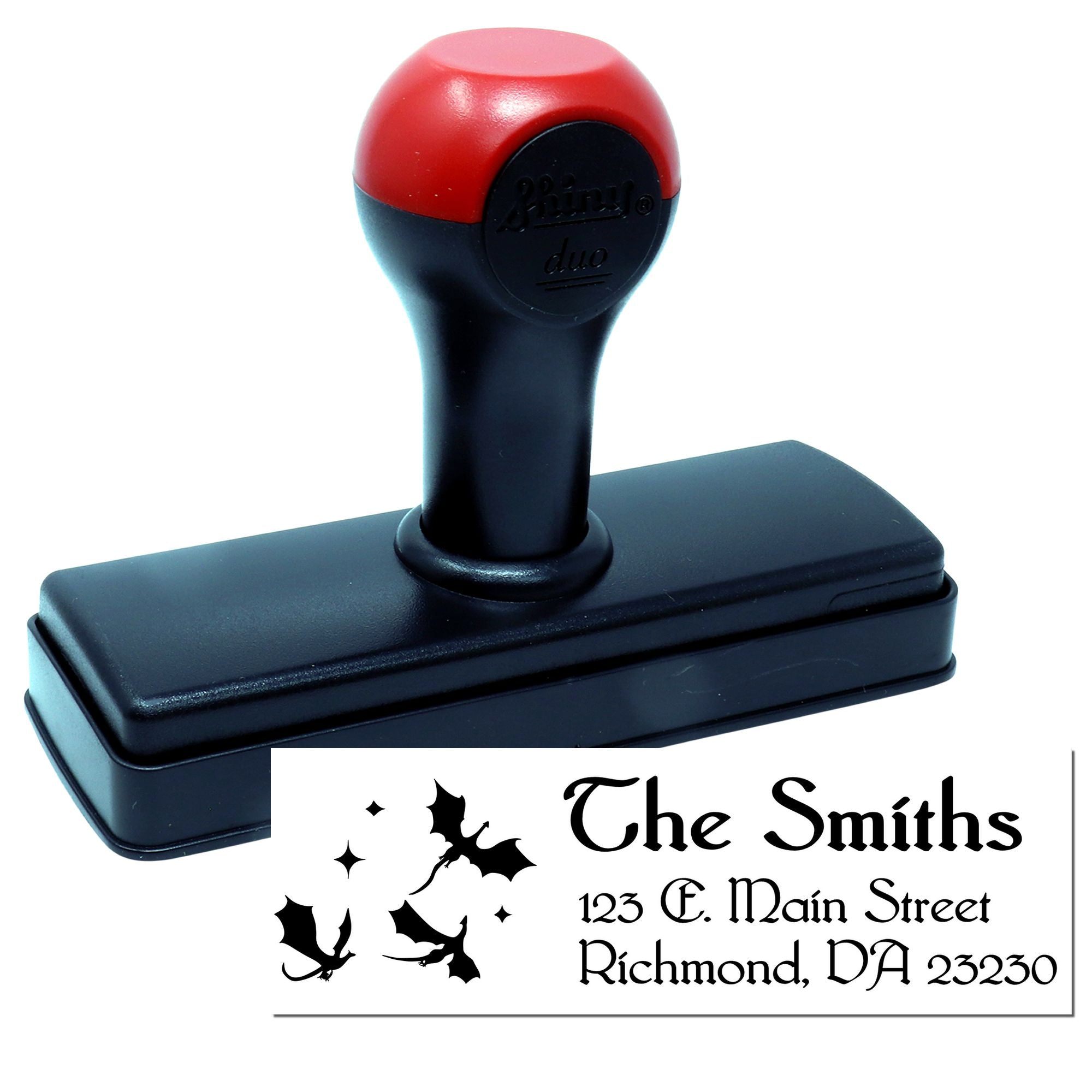 Personalized self-inking rubber return address stamp with Halloween bat design and The Smiths address.