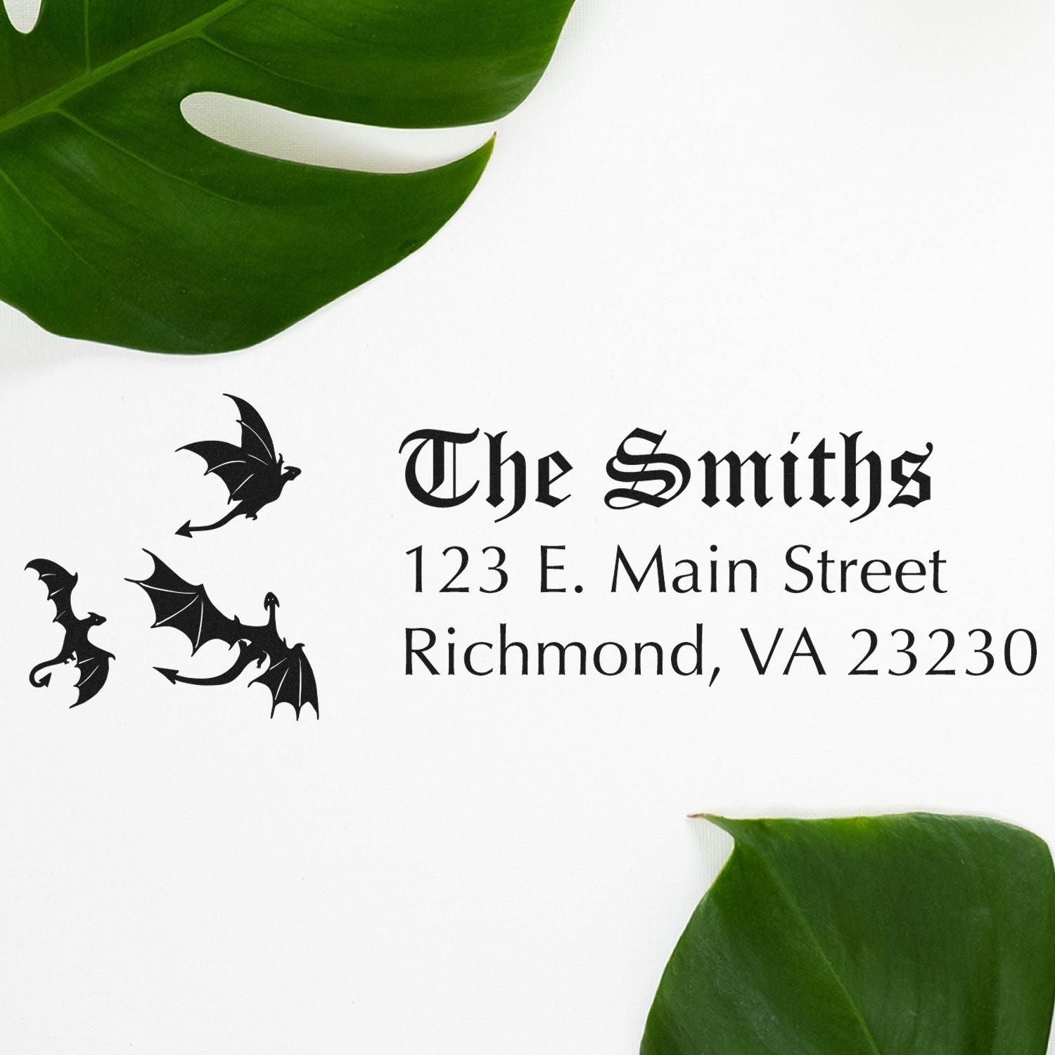 Custom gothic return address rubber stamp for The Smiths, with bats and dragons, featuring 123 E. Main Street, Richmond, VA 23230.