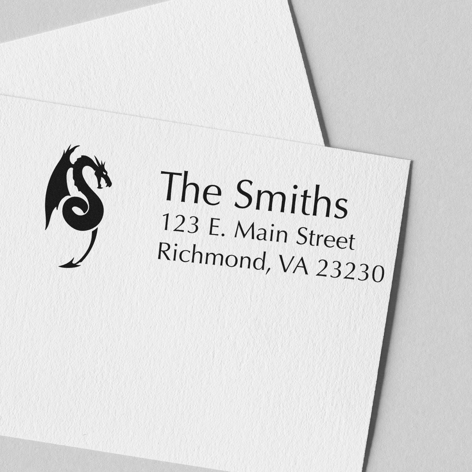 Custom return address rubber stamp with dragon logo for The Smiths, Richmond, VA 23230.