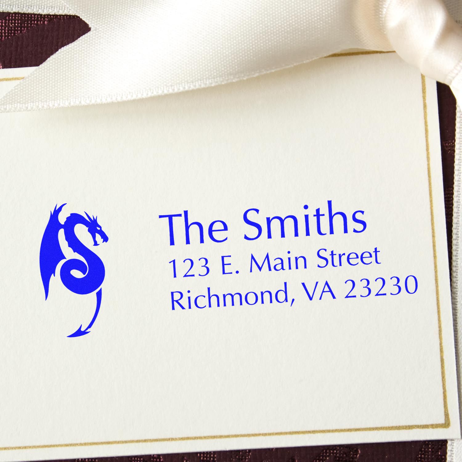Custom rubber address stamp with dragon logo for The Smiths, 123 E. Main Street, Richmond, VA 23230