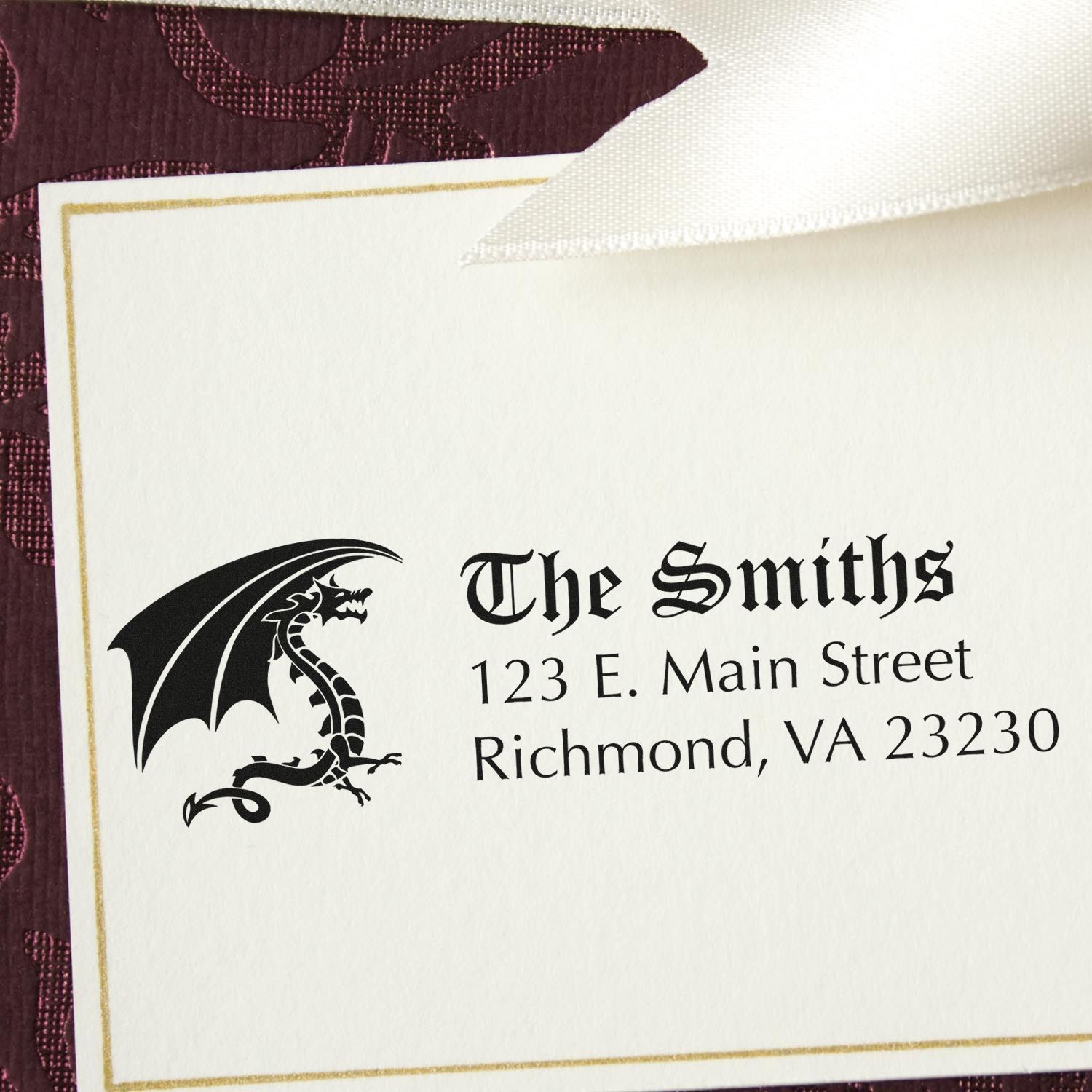 Personalized return address rubber stamp for The Smiths with dragon logo and Richmond, VA address.