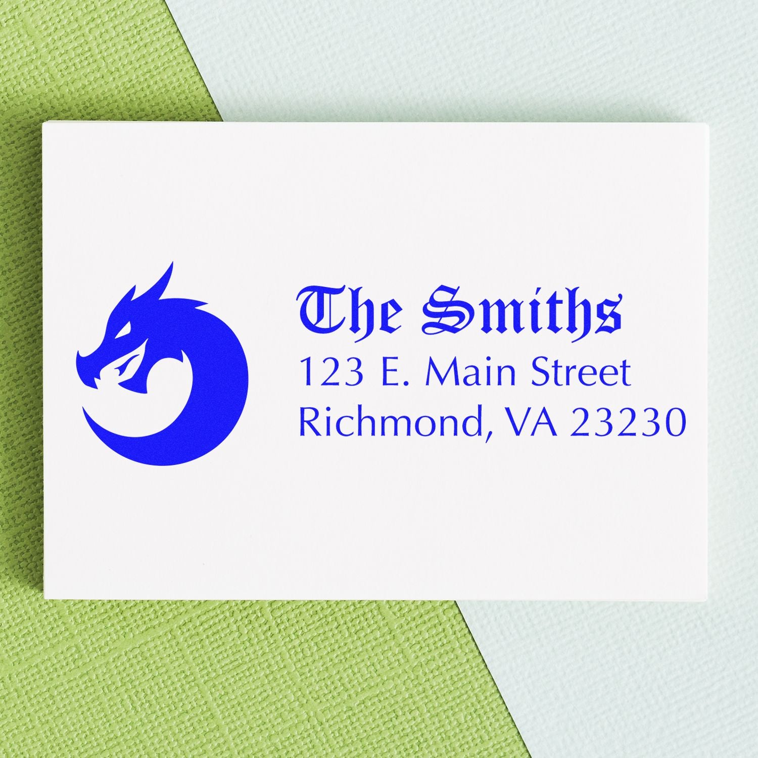 Custom return address rubber stamp with dragon logo for The Smiths, 123 E. Main Street, Richmond, VA 23230.
