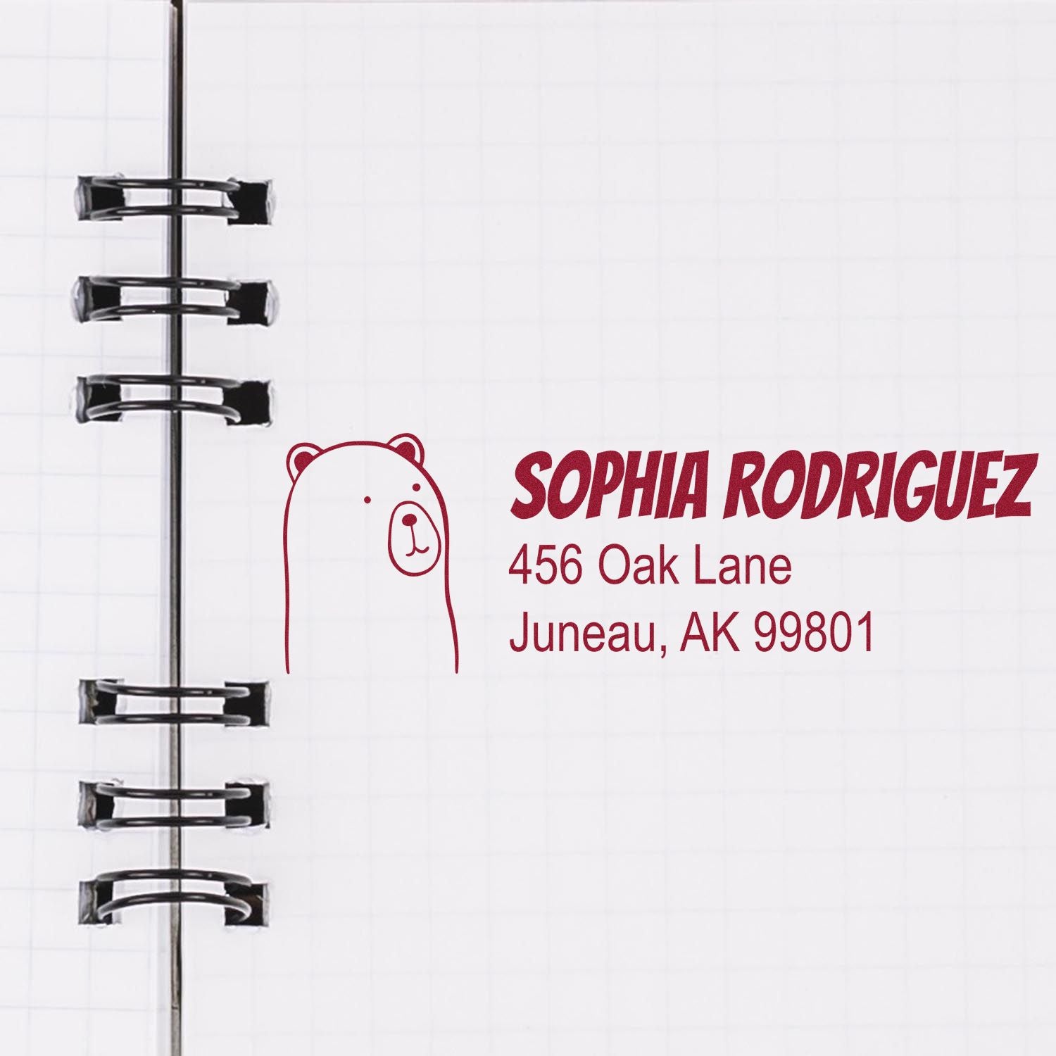 Custom rubber stamp return address with bear logo for Sophia Rodriguez, 456 Oak Lane, Juneau, AK 99801