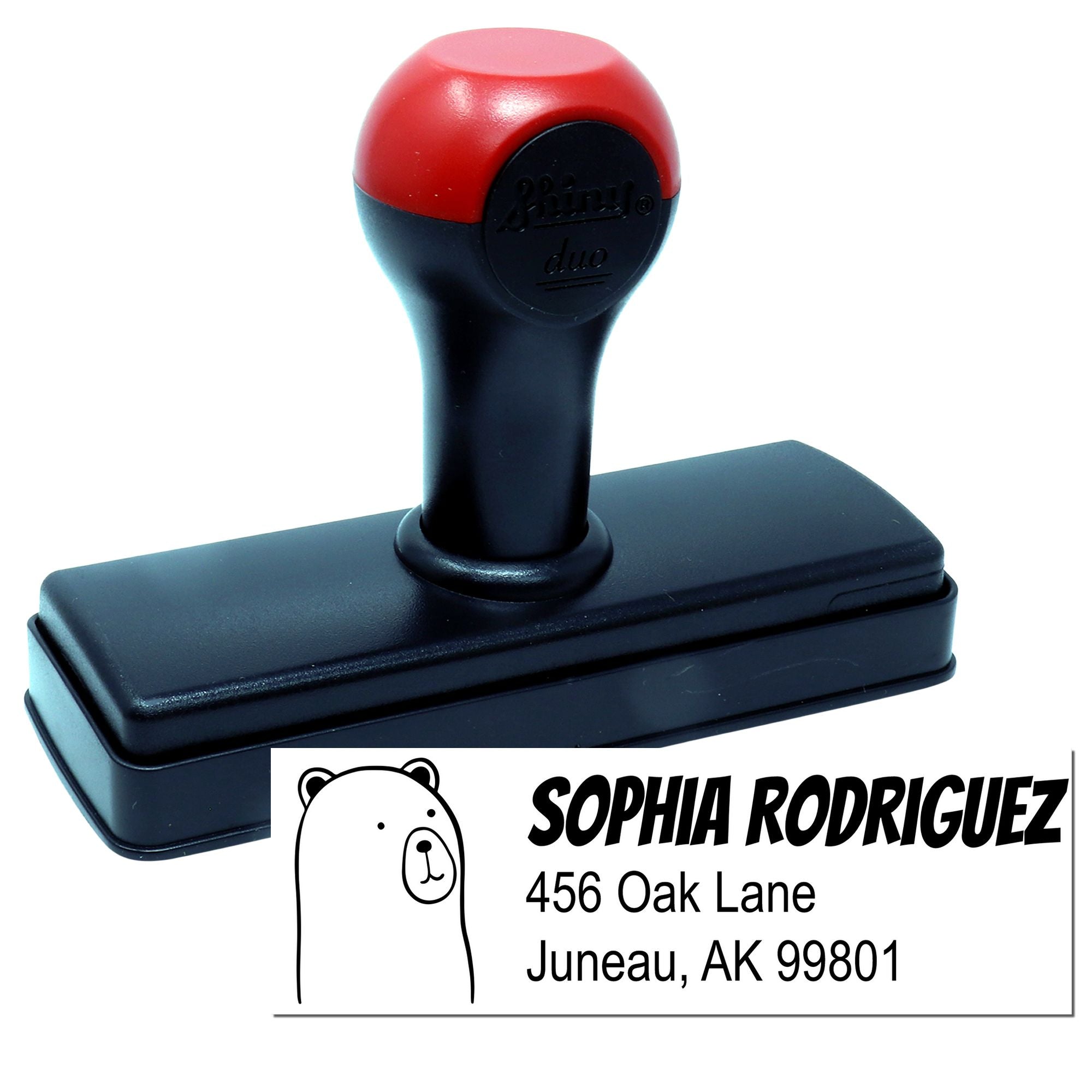Custom self-inking rubber address stamp with bear design, personalized with name and mailing address for return mail.