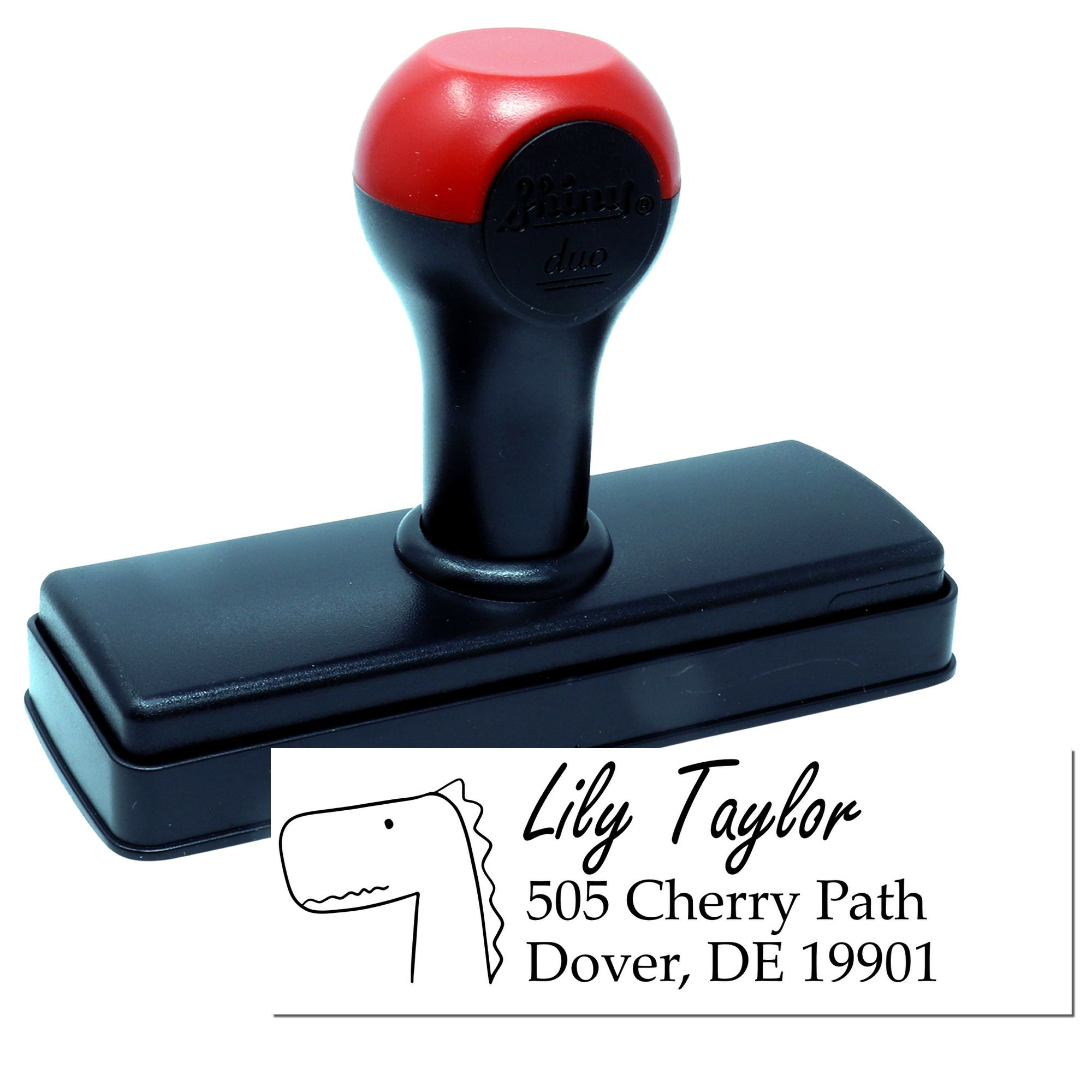 Custom self-inking rubber return address stamp with dinosaur design for personalized mail and envelopes.