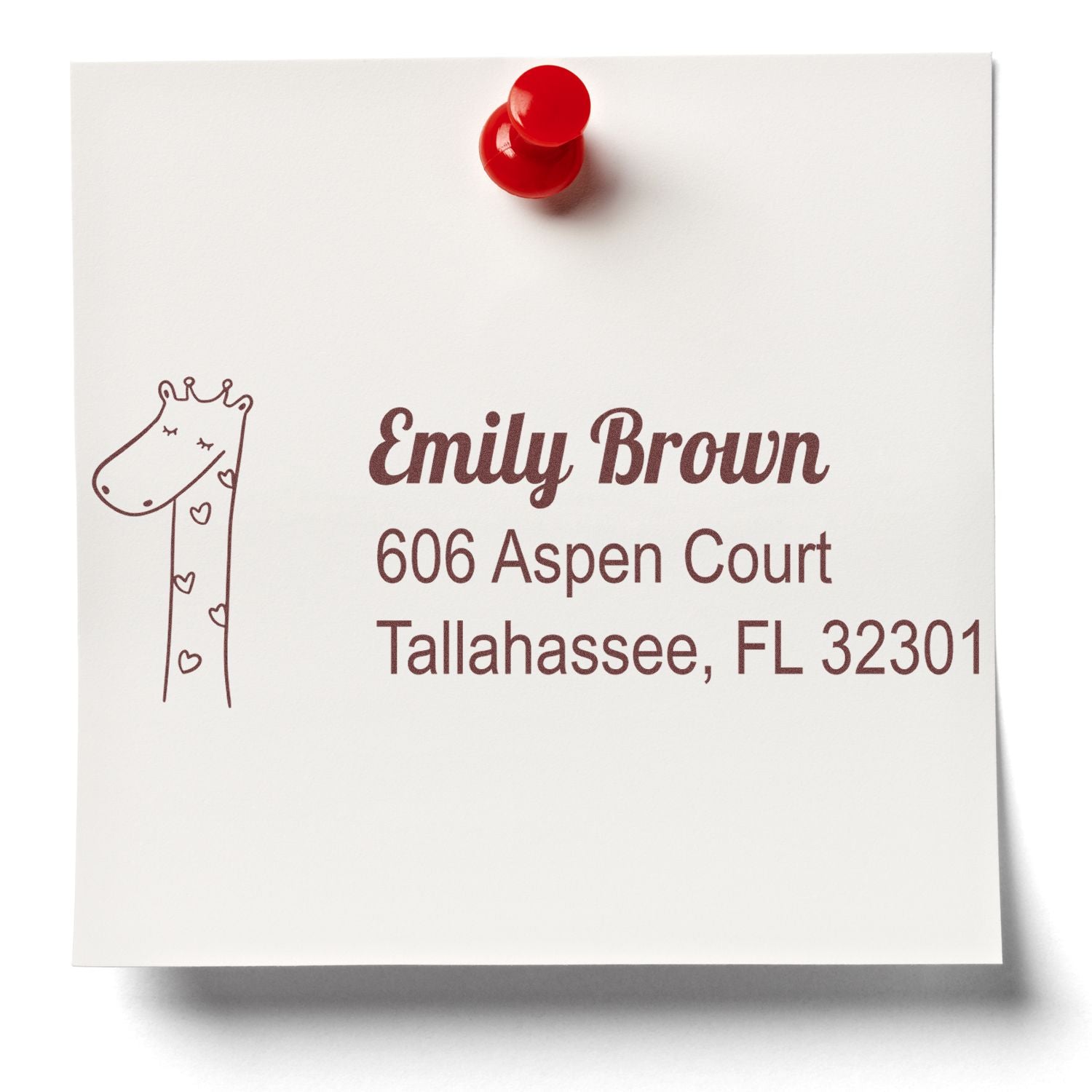 Custom giraffe address rubber stamp with Emily Brown name and Tallahassee, FL return address on white paper.
