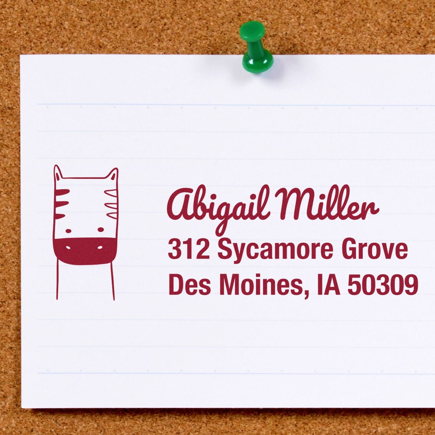 Personalized return address rubber stamp with cat design for Abigail Miller, Des Moines, IA 50309.