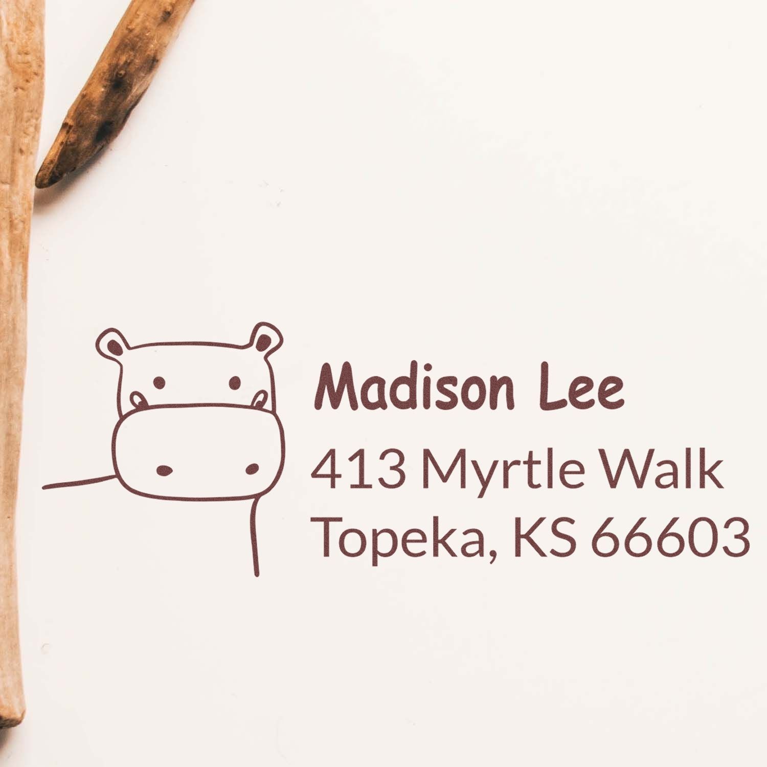Personalized hippo address rubber stamp for Madison Lee, 413 Myrtle Walk, Topeka, KS 66603.