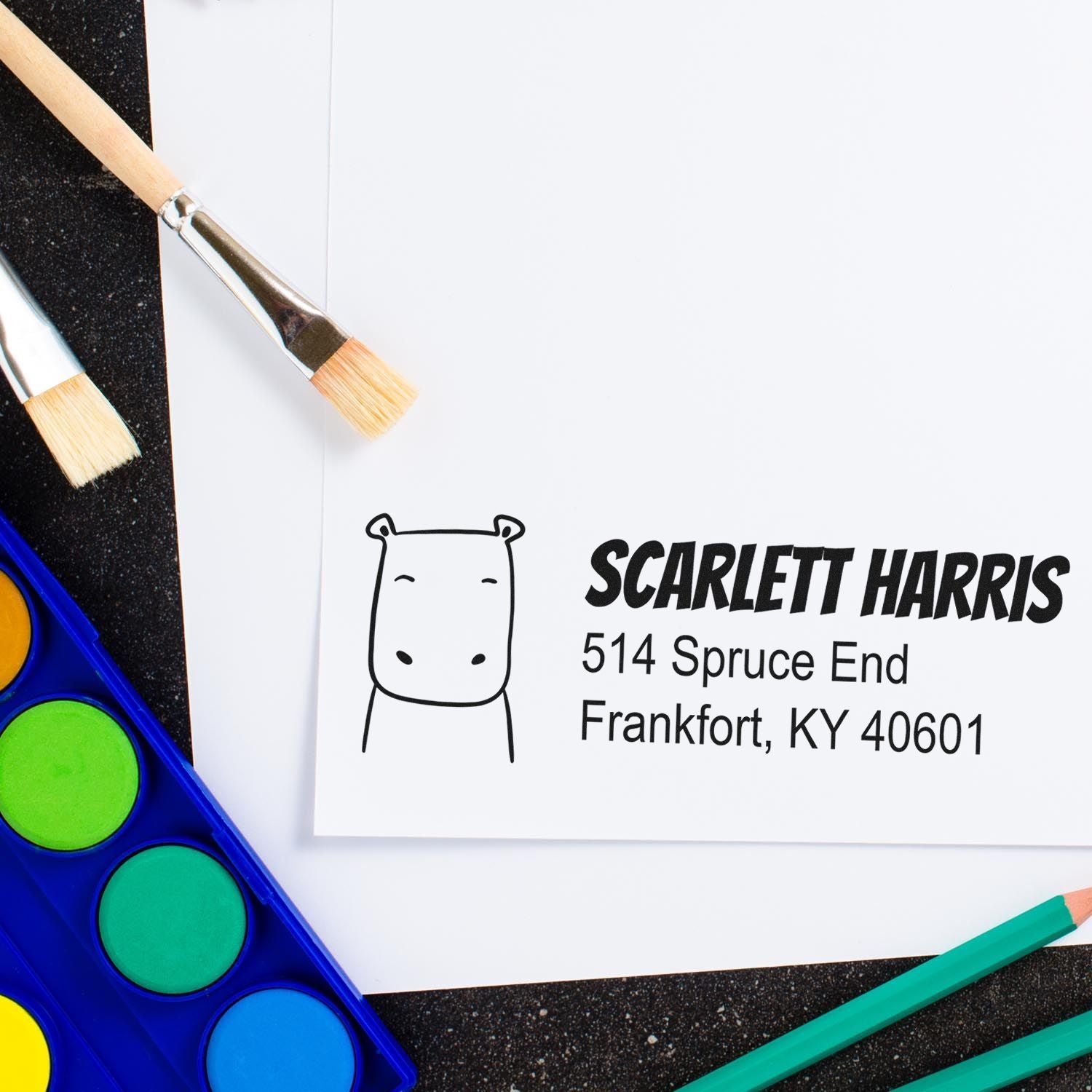 Custom address rubber stamp with hippo logo, Scarlett Harris name, and Frankfort, KY mailing details.