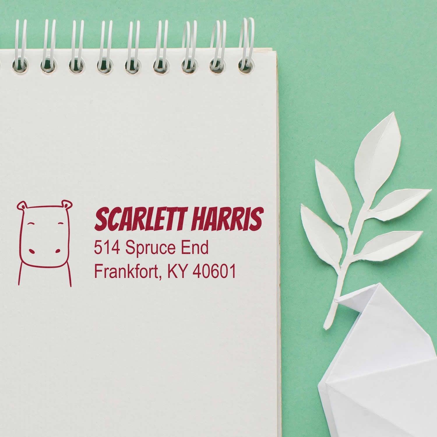Custom address rubber stamp with hippo logo and return address for Scarlett Harris, Frankfort, KY stationery.