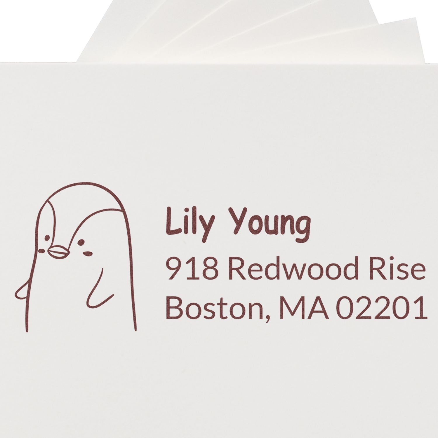 Custom return address rubber stamp with illustrated animal for Lily Young, 918 Redwood Rise, Boston, MA 02201.