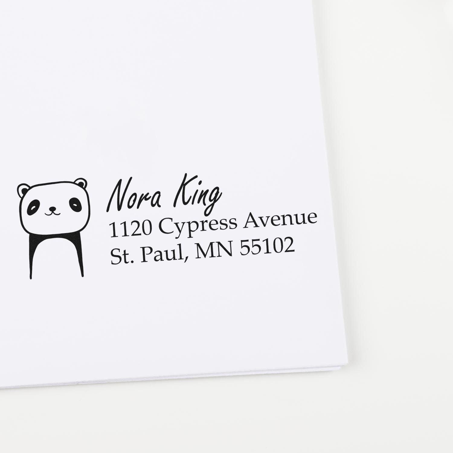 Custom panda address rubber stamp with name Nora King and St. Paul, MN mailing address.