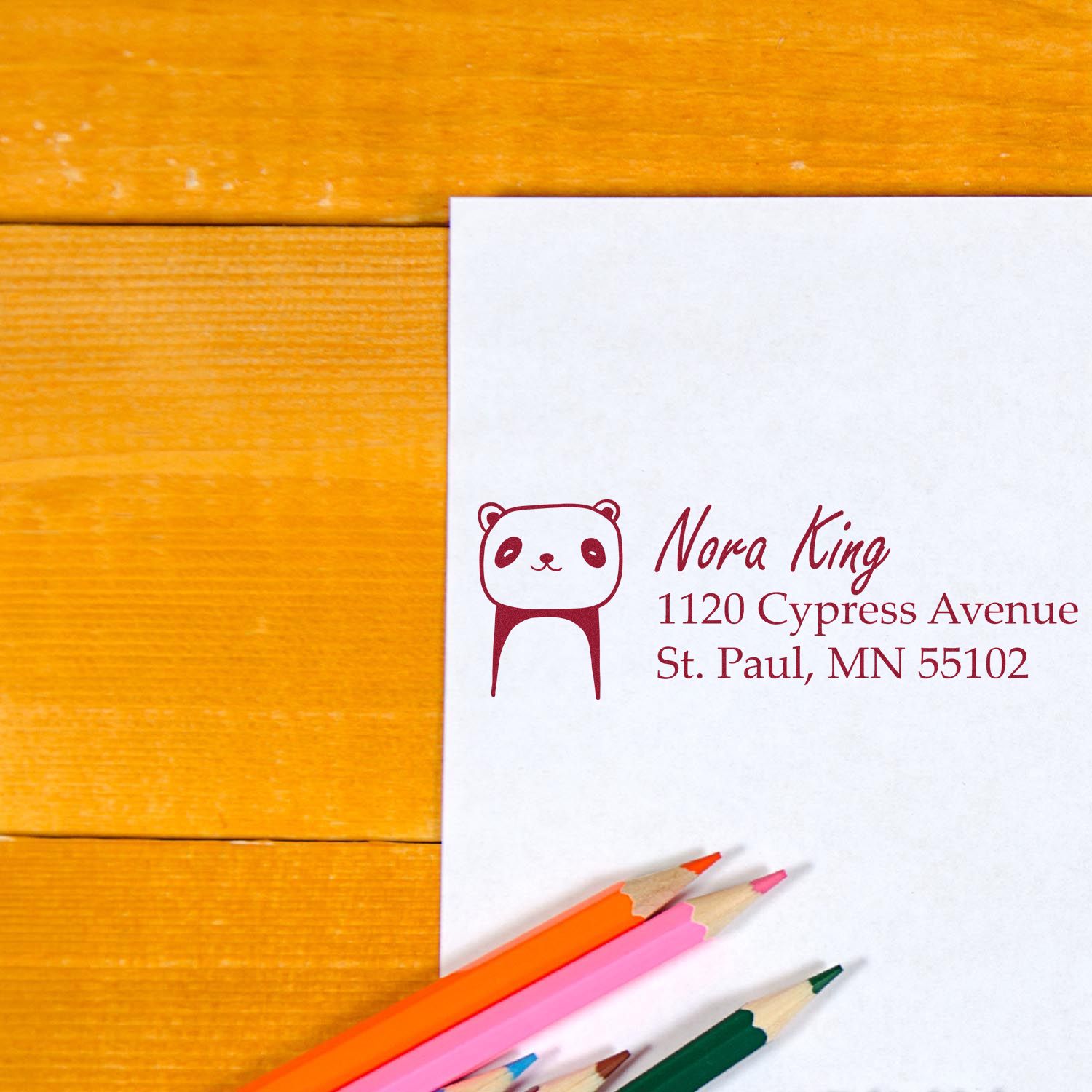 Custom panda return address rubber stamp on envelope, featuring name and St. Paul, MN address for mailing.