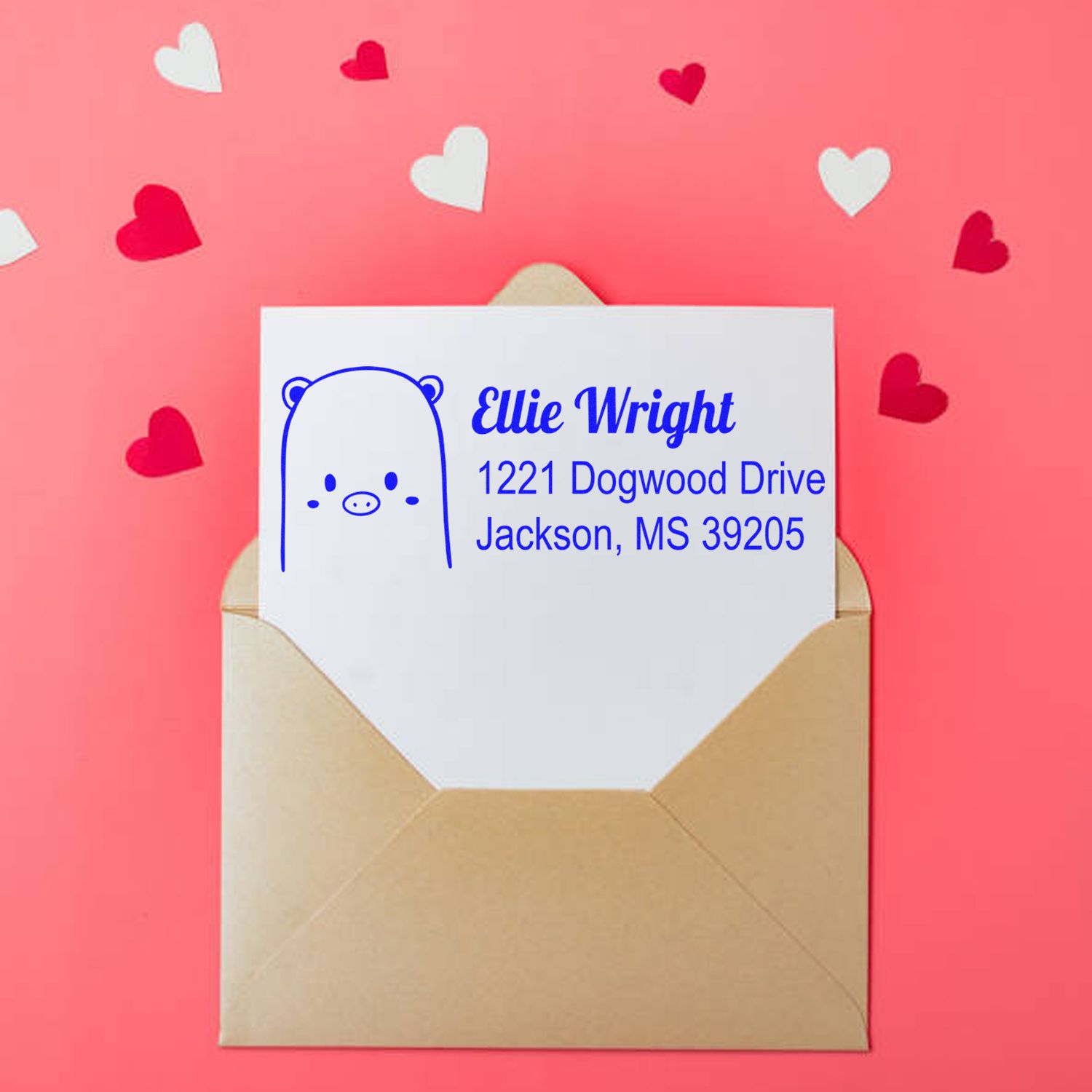 Personalized bear address stamp on envelope, featuring name and mailing address for custom rubber stamp designs.