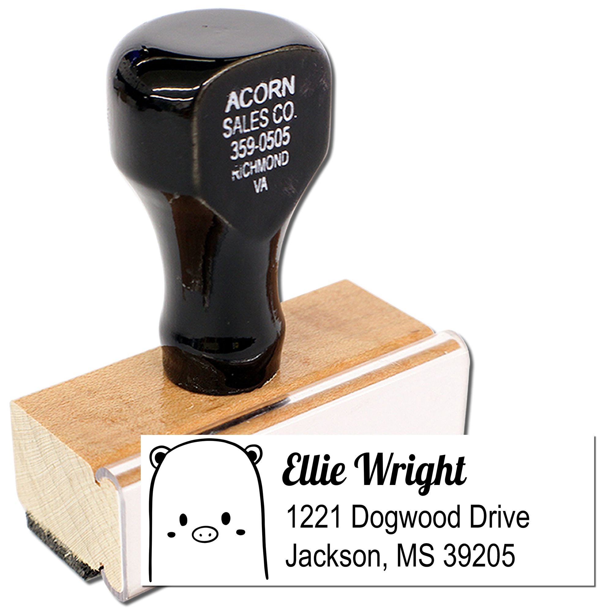 Custom wooden rubber address stamp with bear design, showing personalized name and address imprint.