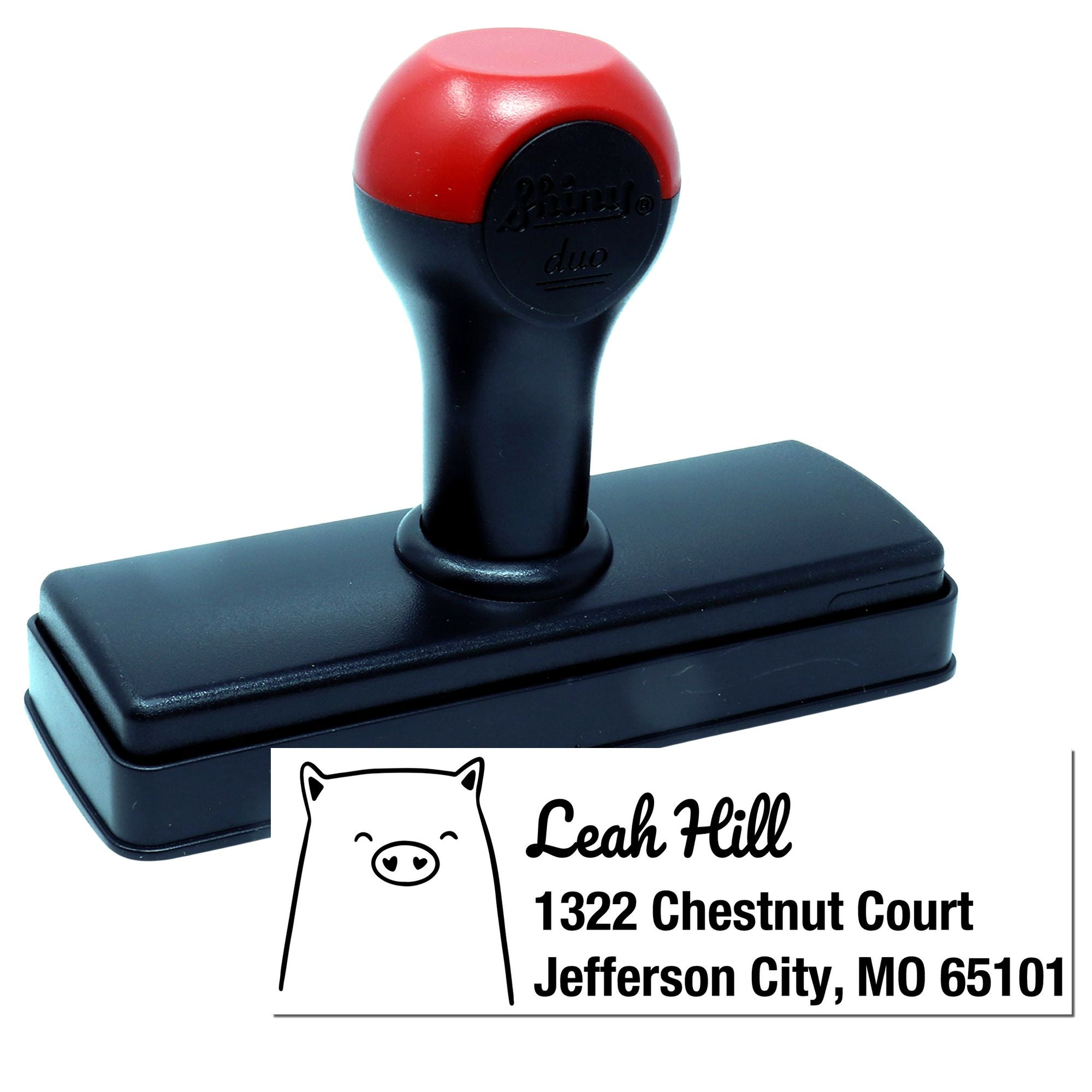 Personalized self-inking rubber address stamp with pig design for Leah Hill, Jefferson City, MO 65101