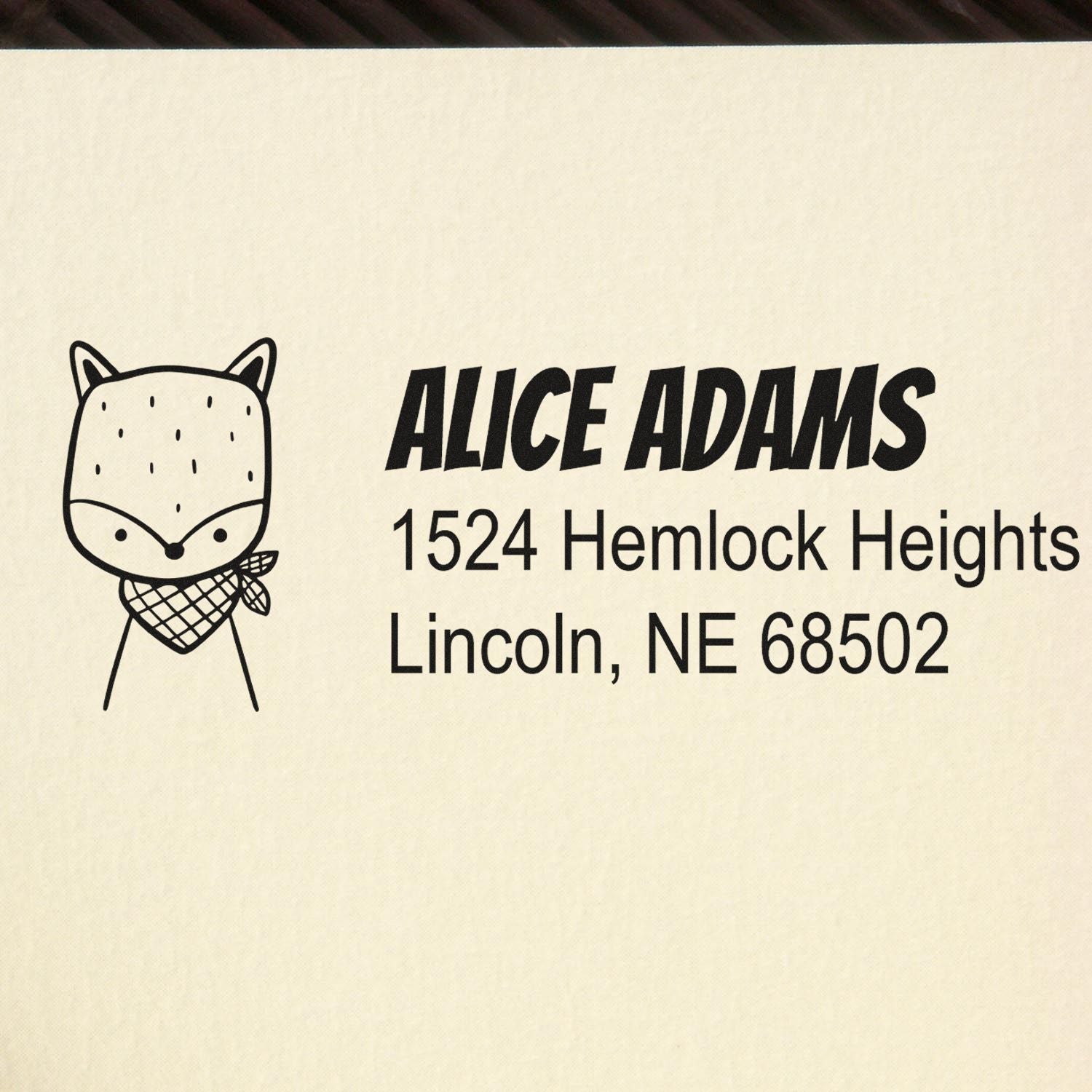 Custom return address rubber stamp with fox icon for Alice Adams, 1524 Hemlock Heights, Lincoln, NE 68502