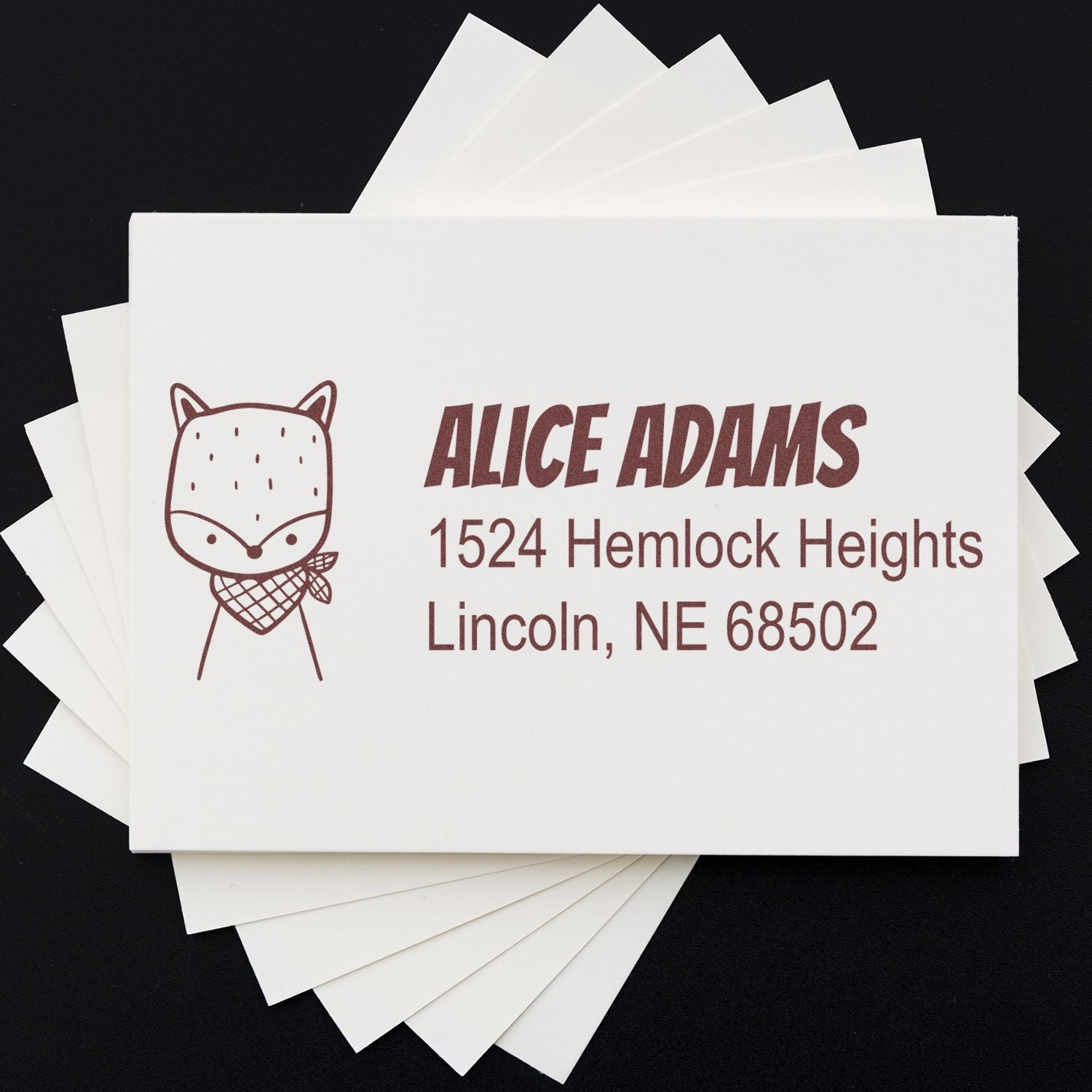 Custom rubber address stamp with fox design for Alice Adams, 1524 Hemlock Heights, Lincoln, NE 68502.