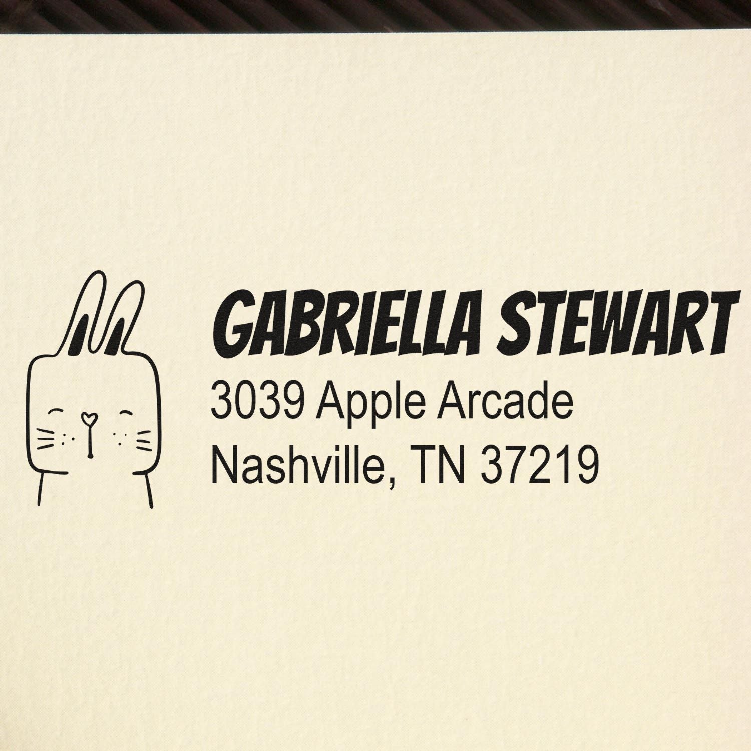 Custom address rubber stamp with bunny icon for Gabriella Stewart, Nashville, TN 37219
