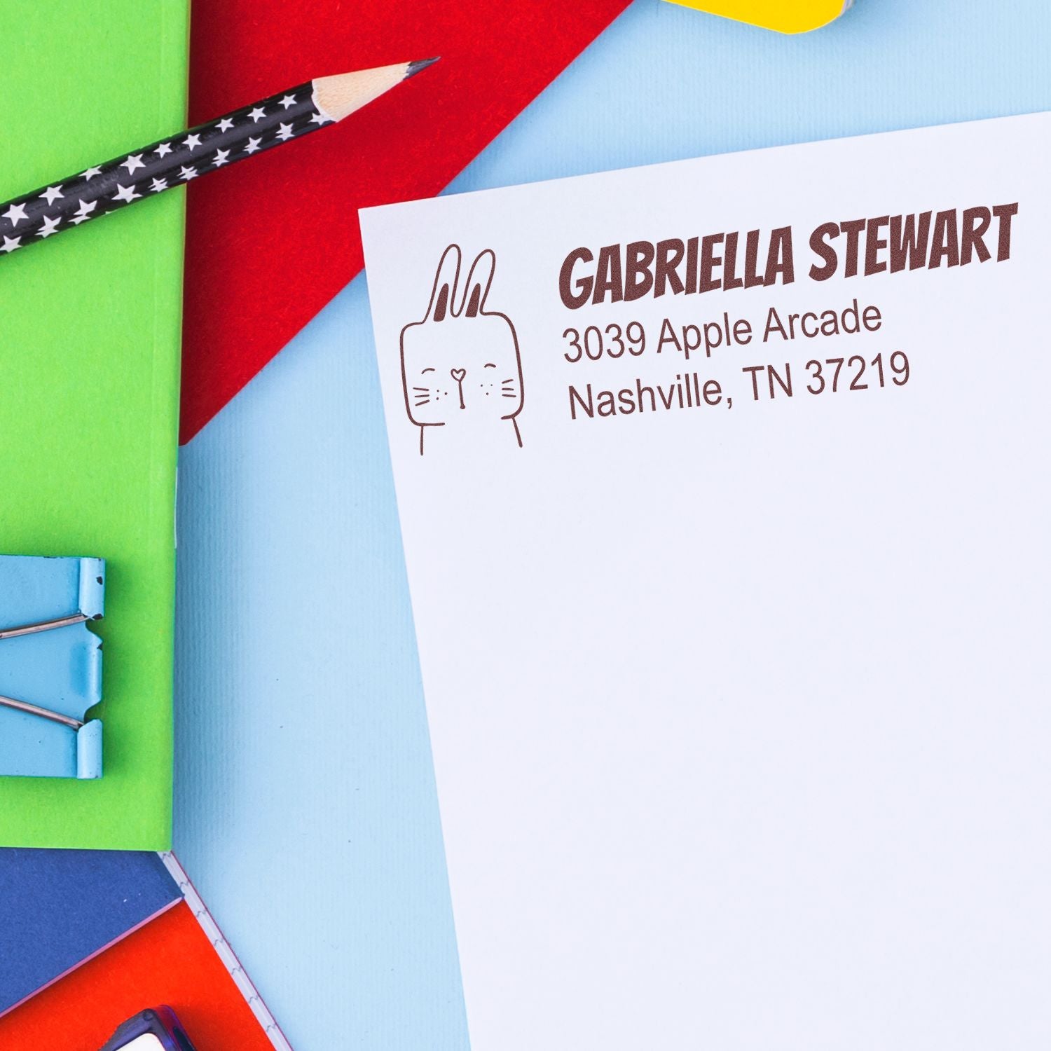 Custom rabbit return address rubber stamp on white envelope for Gabriella Stewart, Nashville, TN.