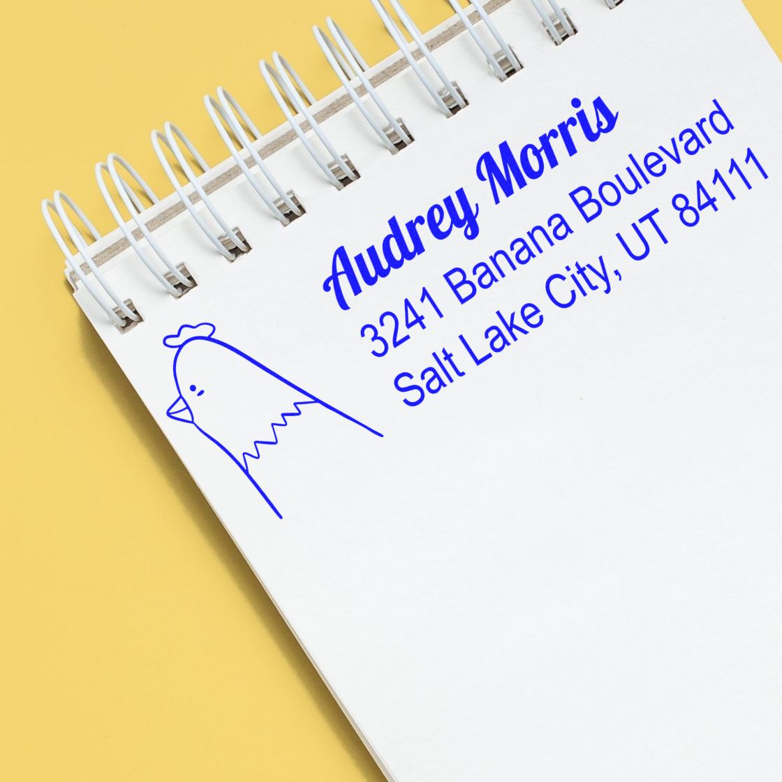 Custom rubber address stamp with chicken design for Audrey Morris, Salt Lake City return mailing and packaging.