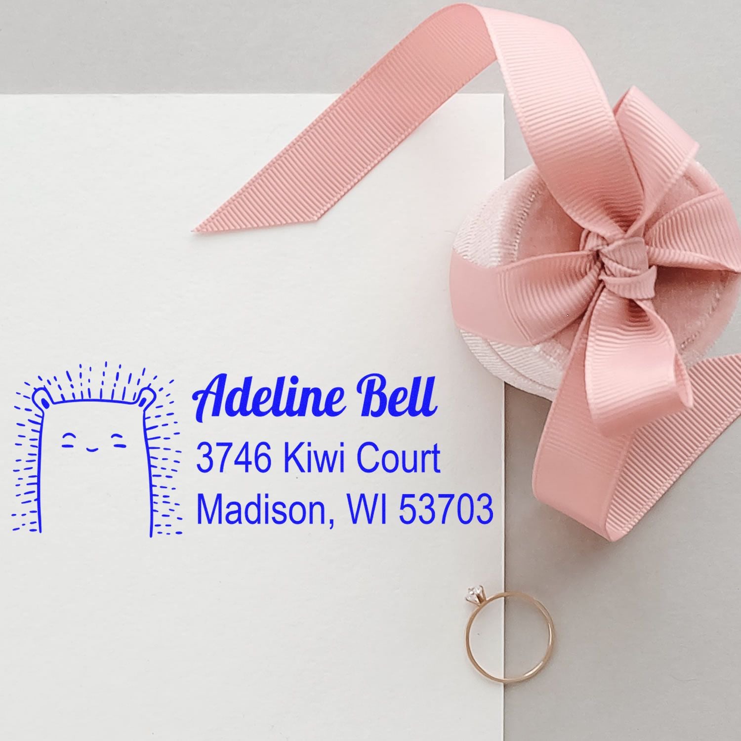 Custom rubber return address stamp with cute bear design for Adeline Bell, perfect for envelopes and stationery.