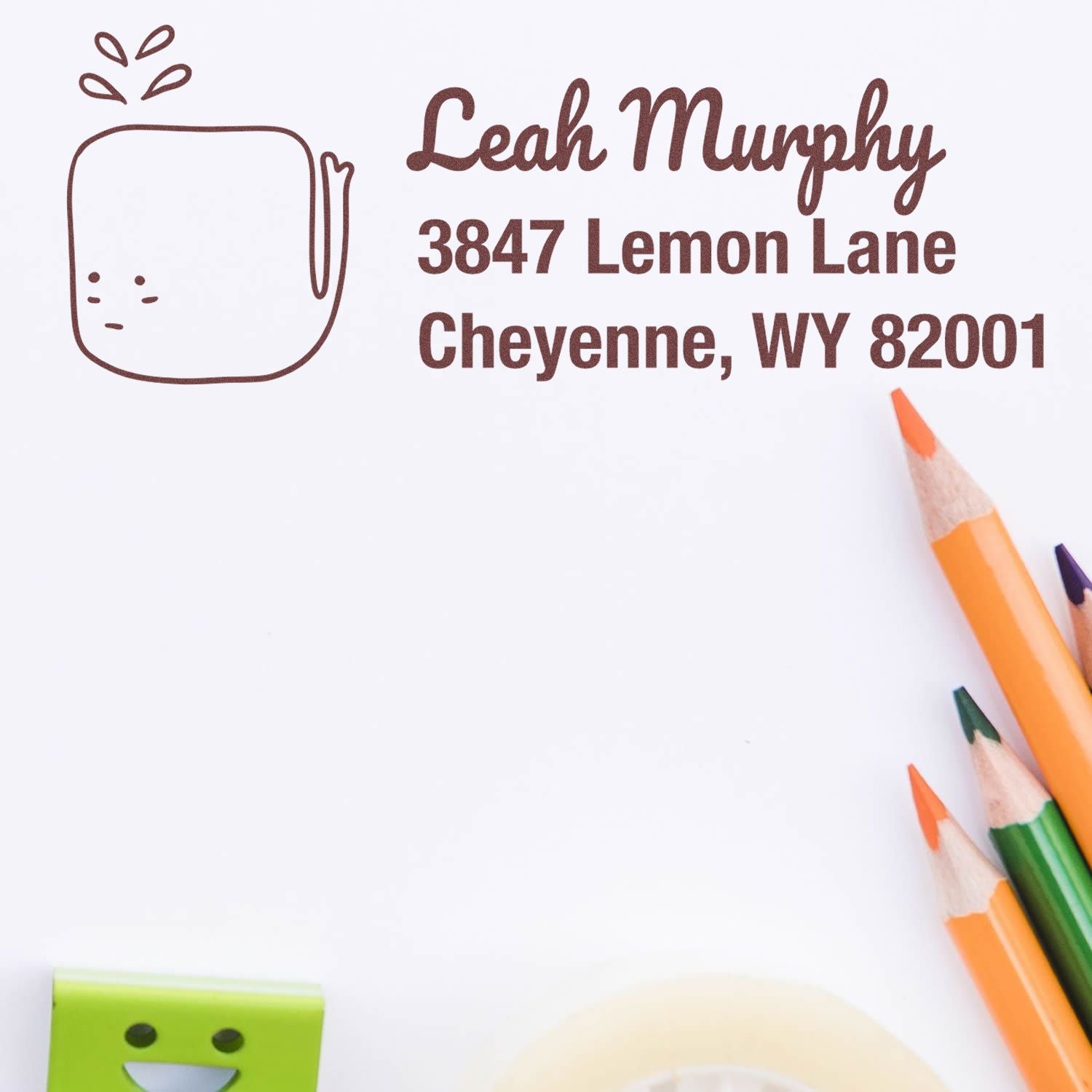 Custom return address rubber stamp with cat icon, Leah Murphy, 3847 Lemon Lane, Cheyenne, WY 82001