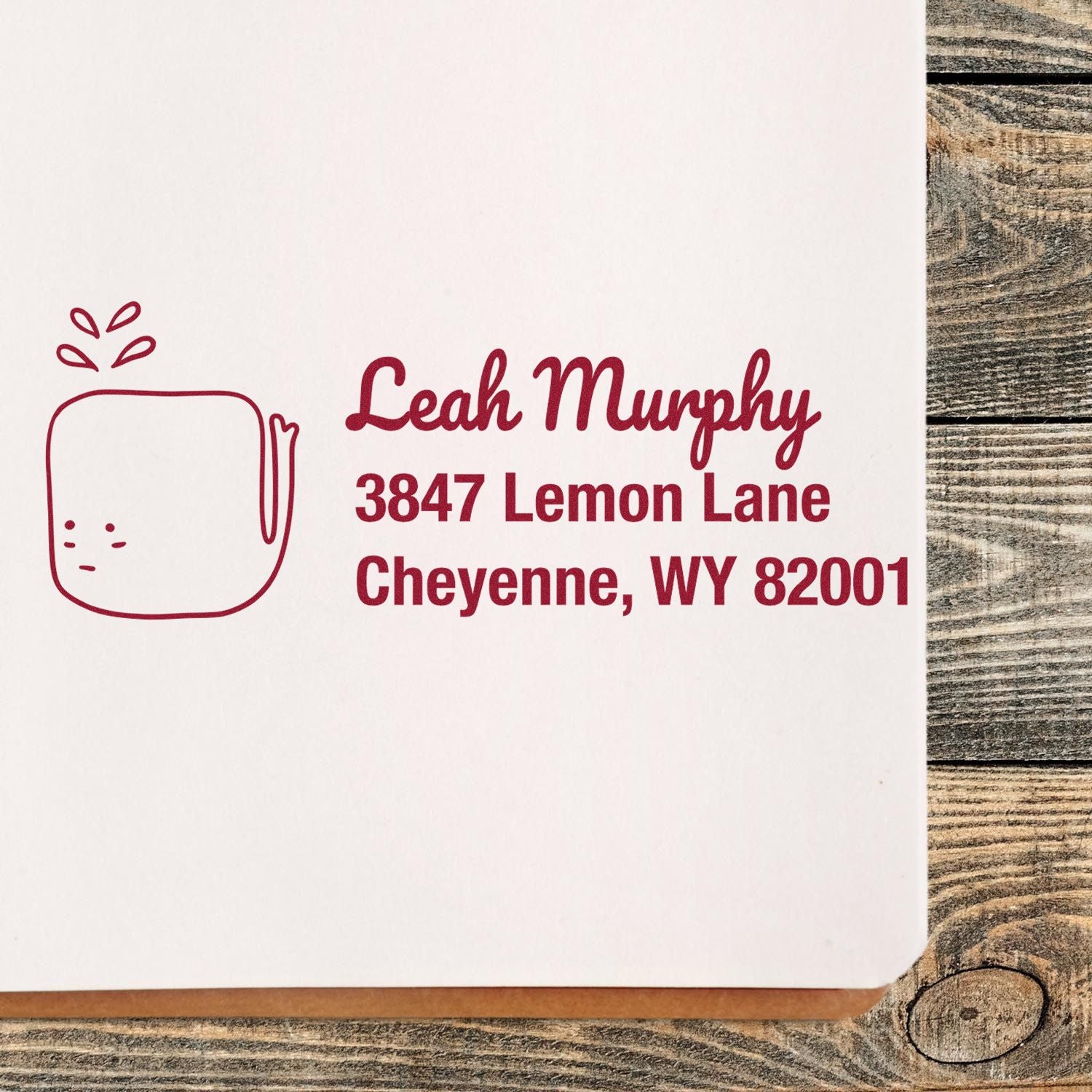 Custom return address rubber stamp with lemon icon for Leah Murphy, Cheyenne, WY.