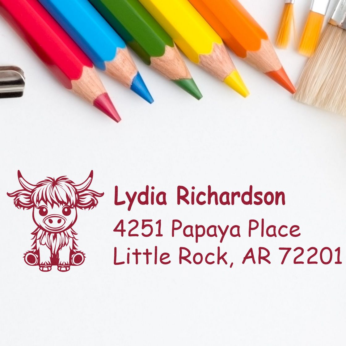 Custom rubber address stamp with cow design, showing Lydia Richardsons personalized return address in Little Rock, AR.
