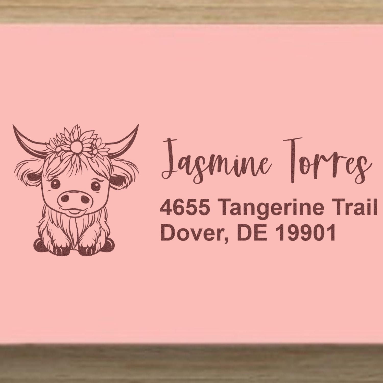 Personalized cow return address rubber stamp with floral horns for Jasmine Torres, Dover, DE 19901.