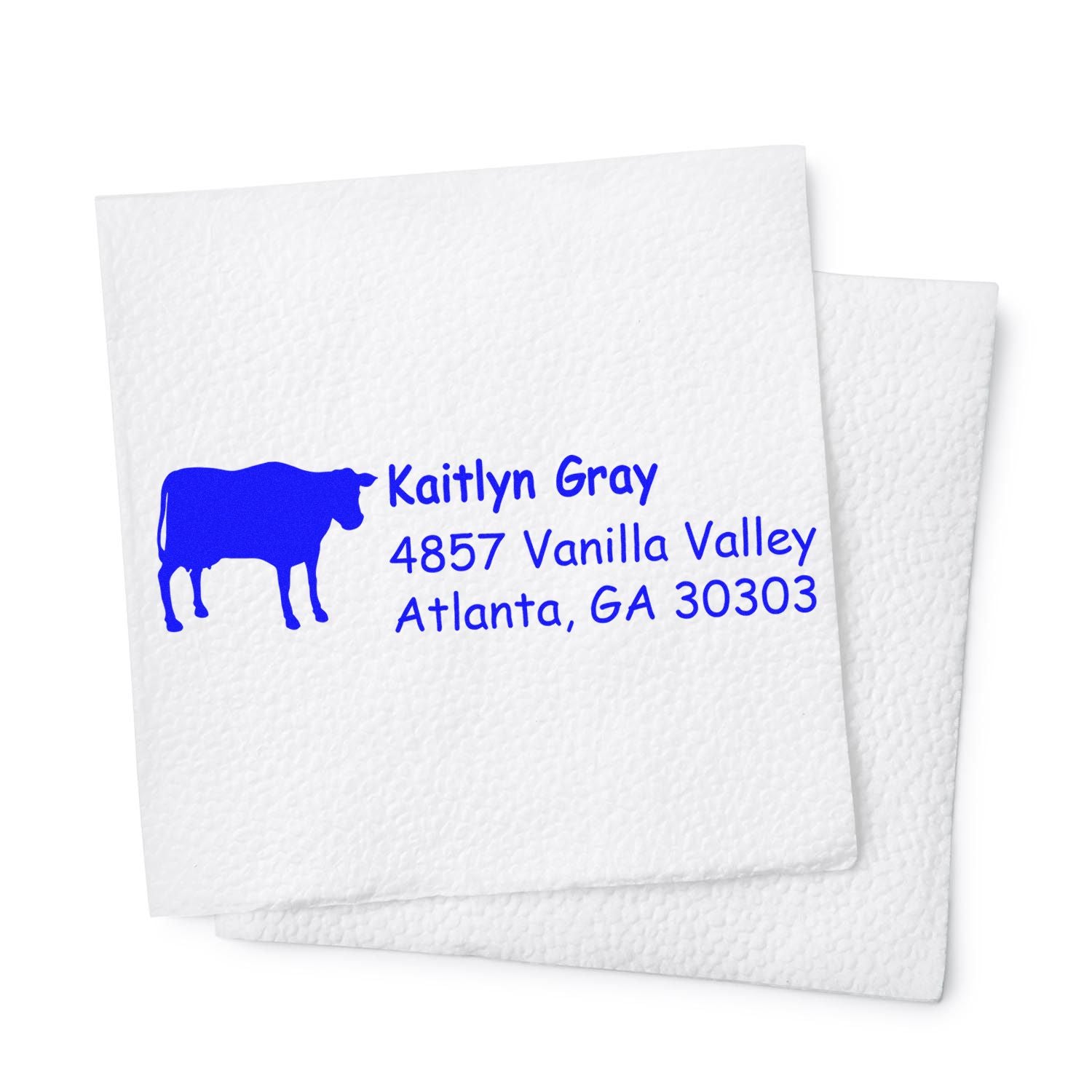 Personalized return address rubber stamp with cow logo, featuring blue text for Kaitlyn Gray in Atlanta, GA 30303.
