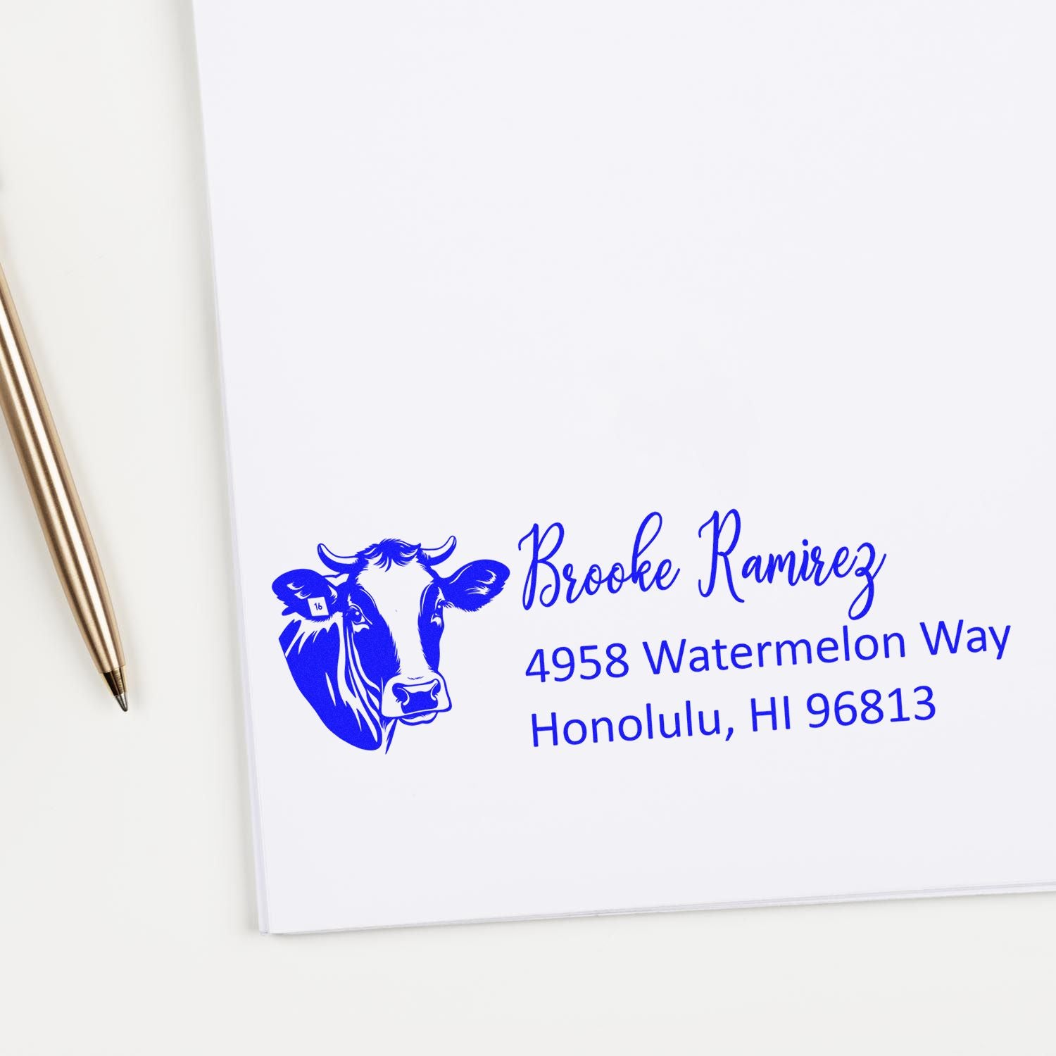 Custom rubber stamp with cow design and personalized return address for Brooke Ramirez in Honolulu, HI.