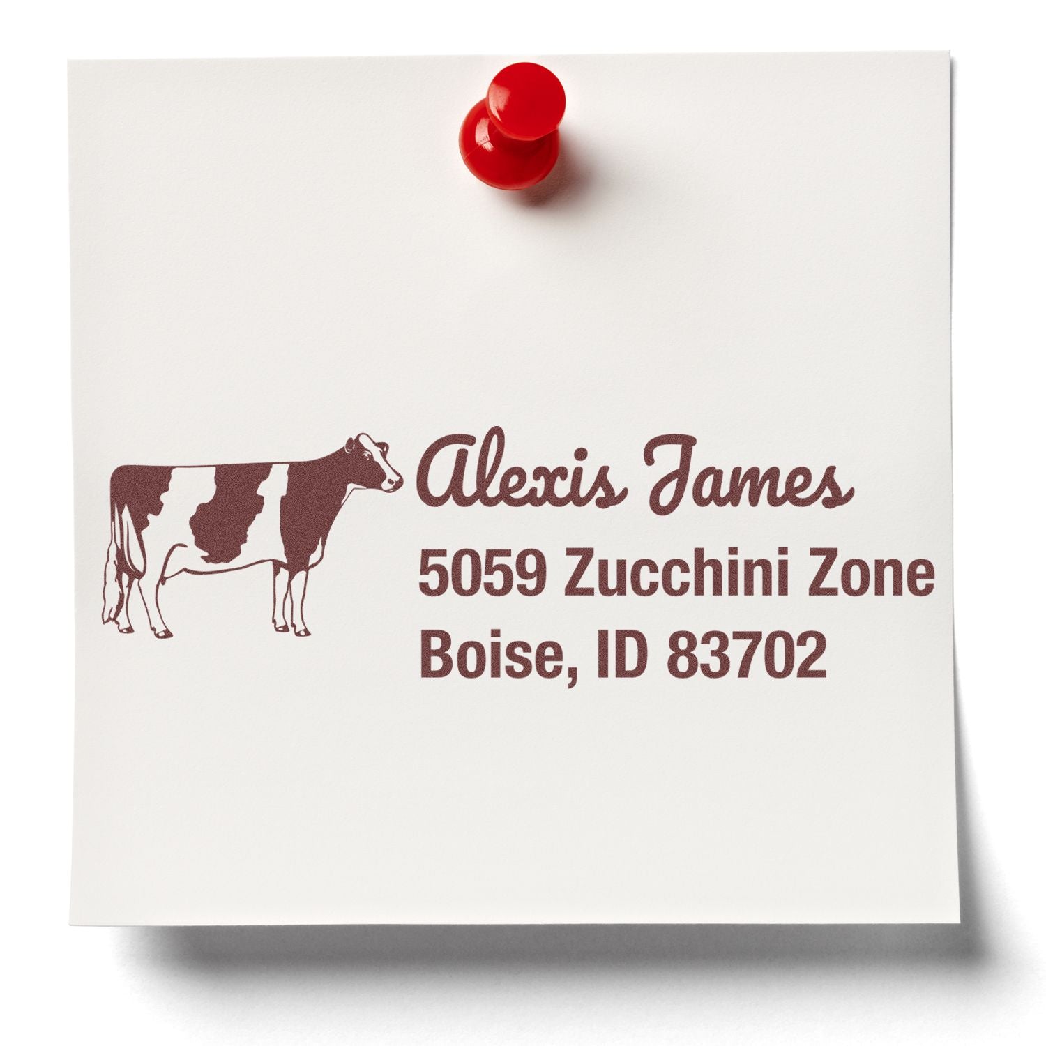 Personalized rubber stamp impression with cow logo and Boise, ID return address for Alexis James.