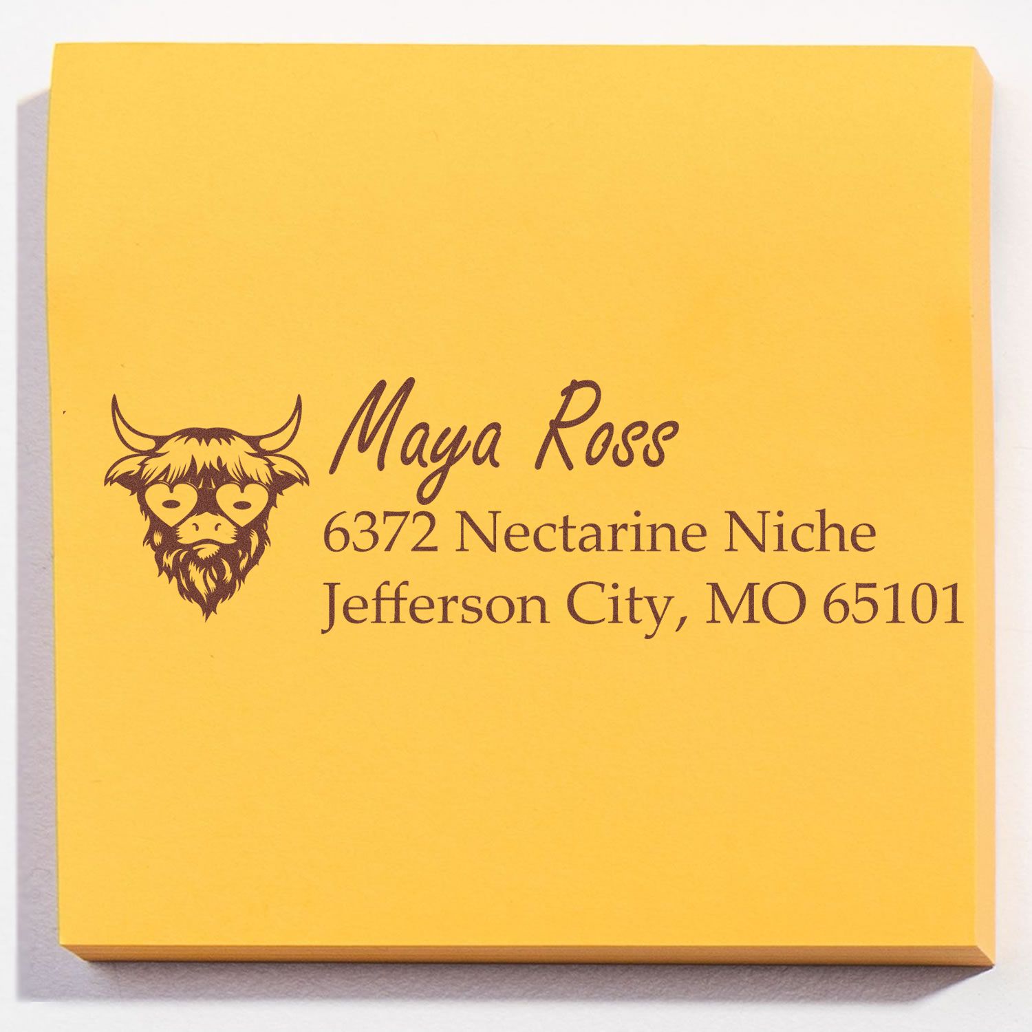 Custom rubber return address stamp for Maya Ross, Jefferson City, MO, with decorative bull logo.