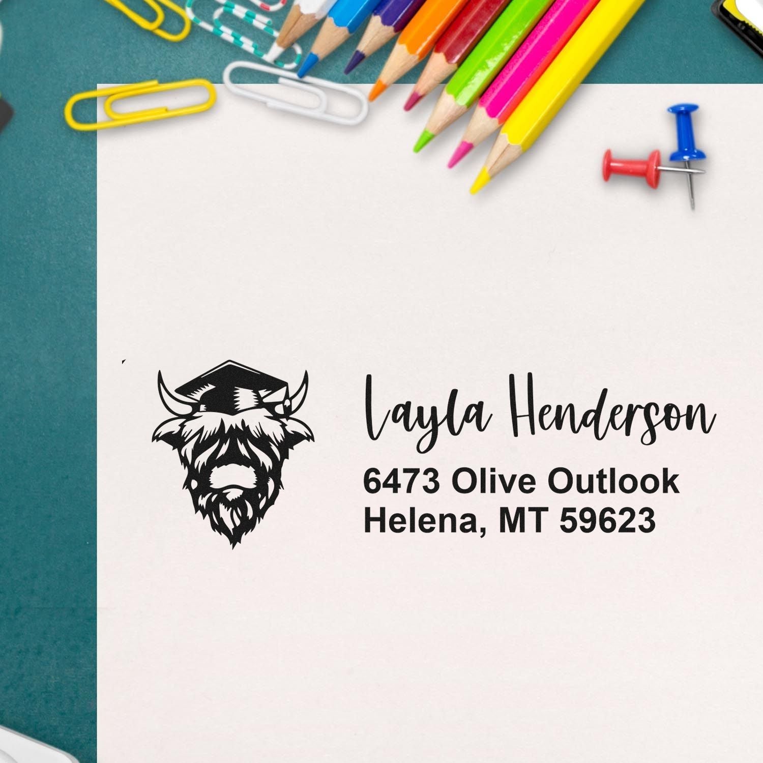 Personalized address rubber stamp mockup with name, address, and school mascot logo for custom stationery.