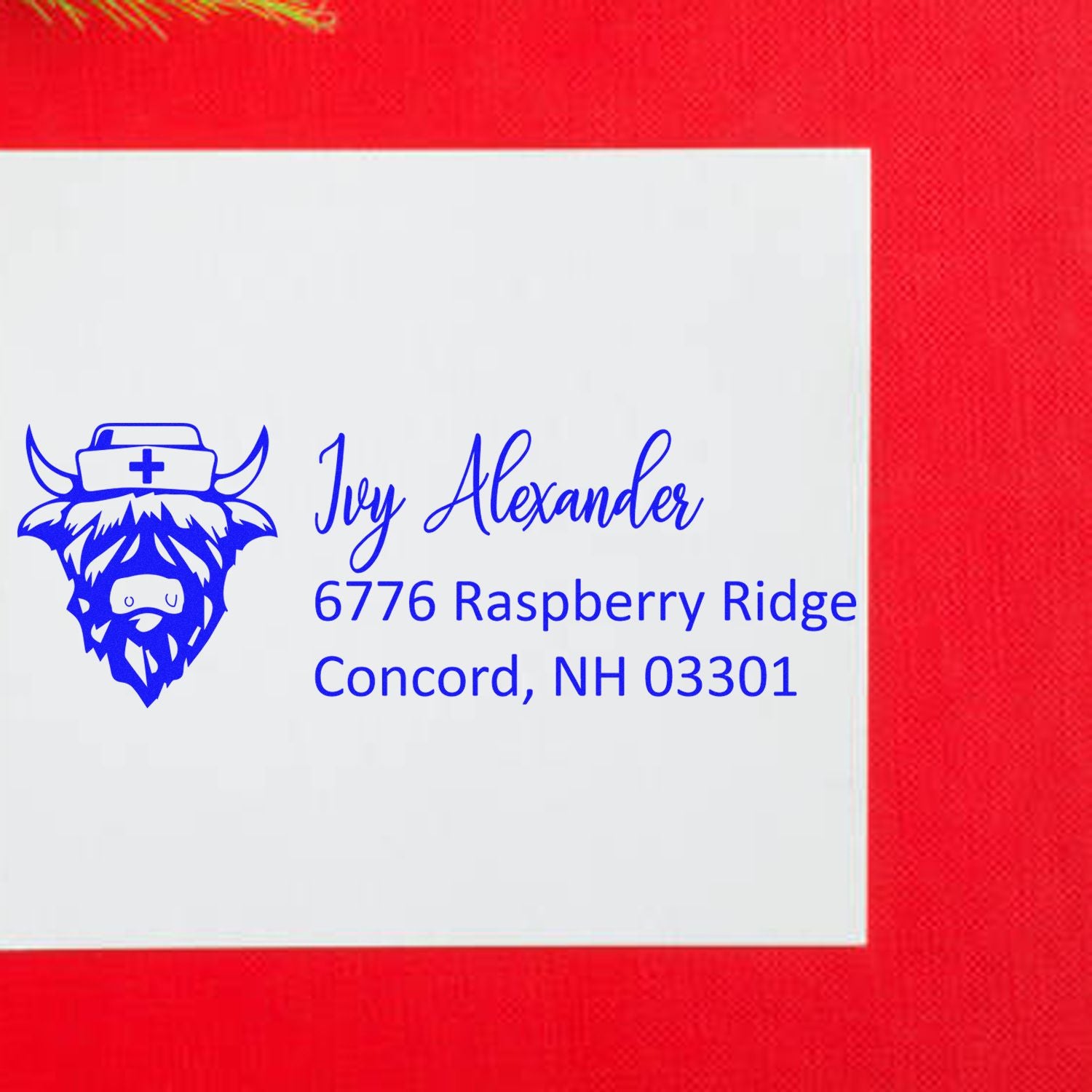 Custom rubber return address stamp with cow logo for Ivy Alexander, 6776 Raspberry Ridge, Concord, NH 03301.