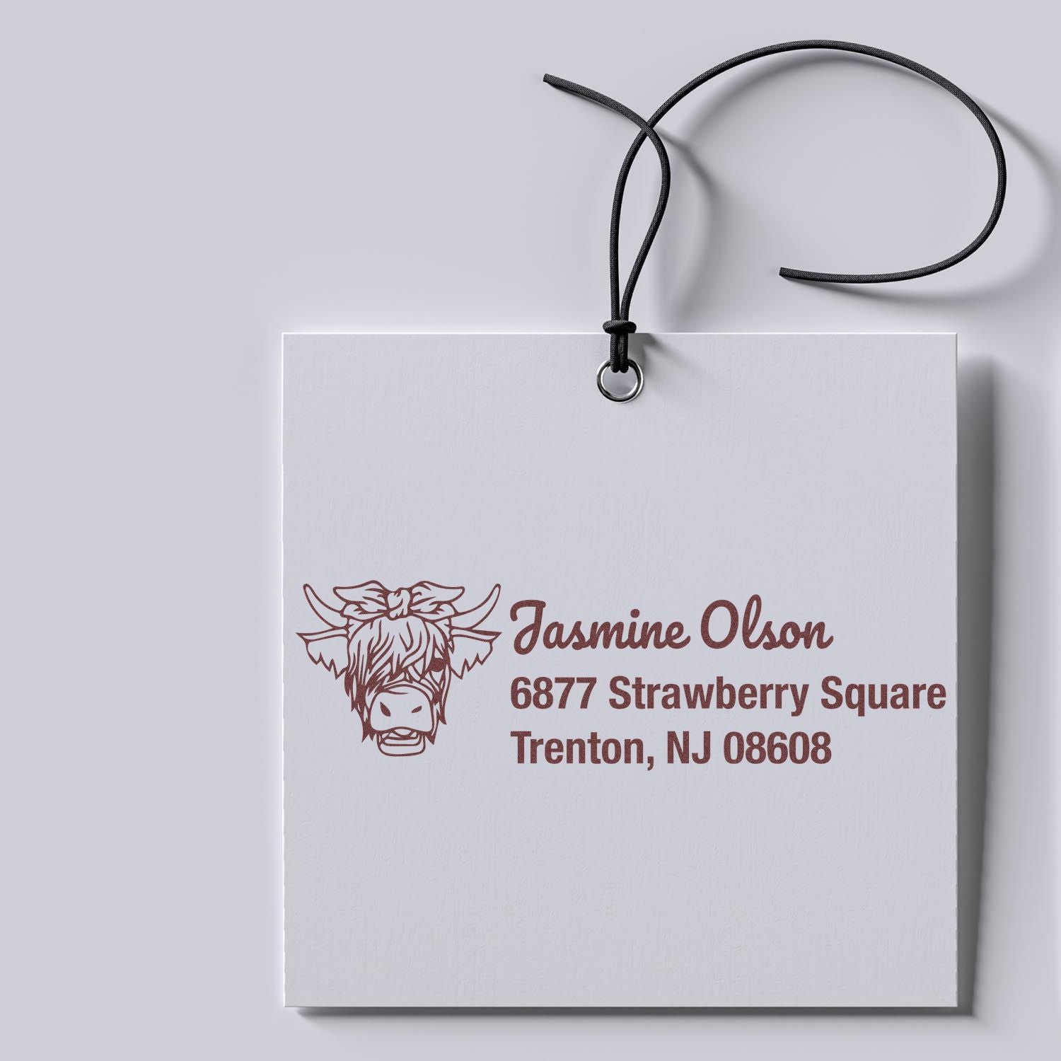 Custom return address rubber stamp with cow illustration for personalized mailing labels and gift tags, featuring name and Trenton, NJ address