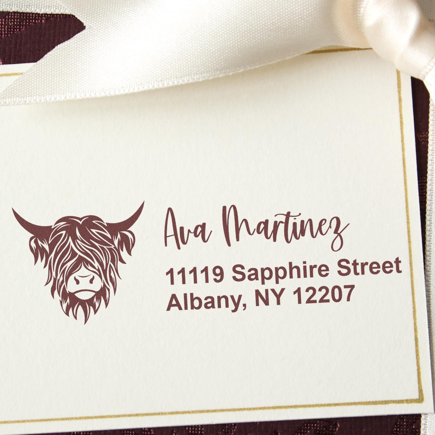 Custom return address rubber stamp design with buffalo logo for Ava Martinez, Albany, NY wedding invitations.
