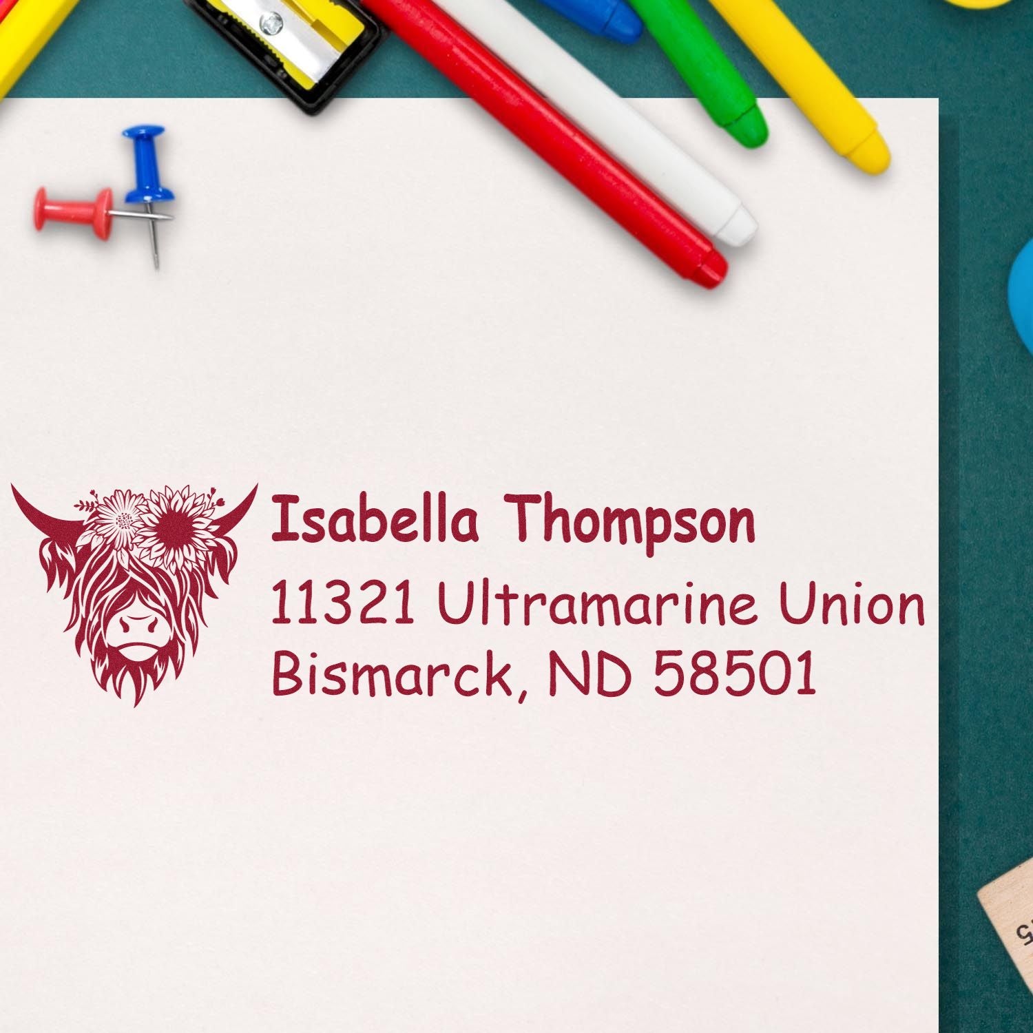 Personalized return address rubber stamp with floral bison design and Isabella Thompson's Bismarck, ND address.