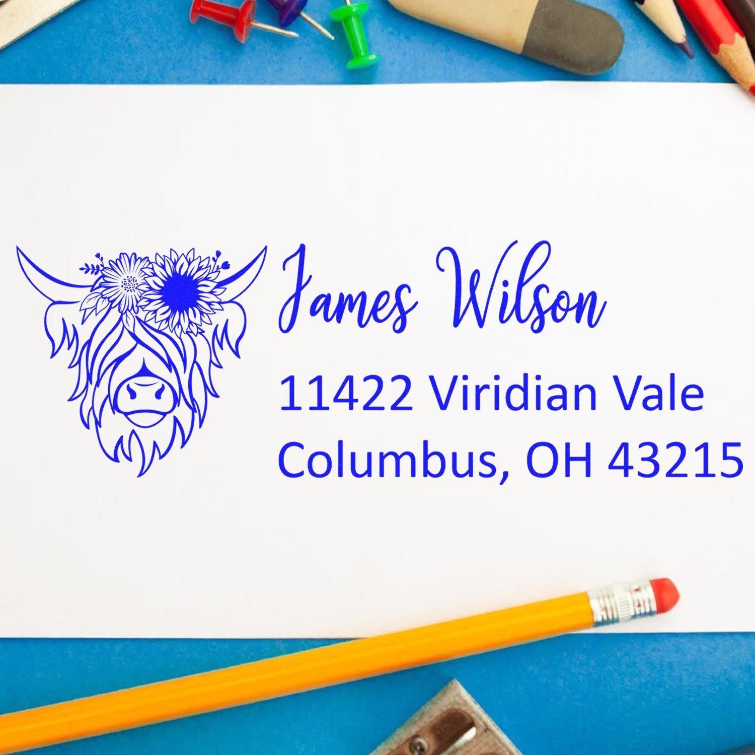 Custom rubber return address stamp with floral bull design, personalized James Wilson name and Columbus, OH address.