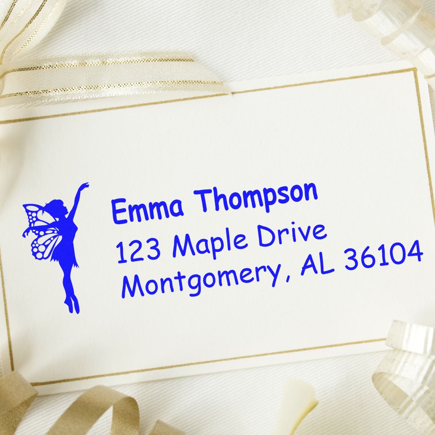 Custom return address rubber stamp with fairy silhouette, featuring Emma Thompson, 123 Maple Drive, Montgomery, AL 36104
