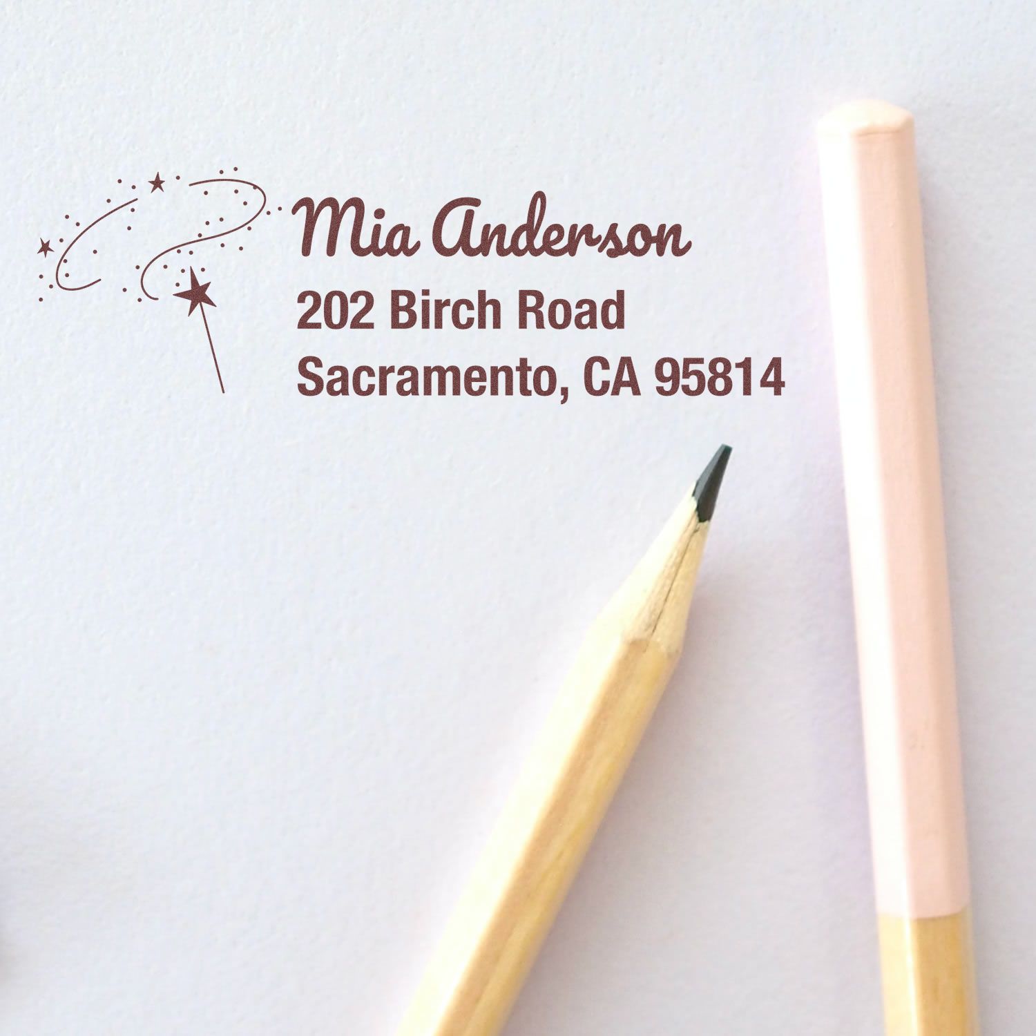 Personalized return address rubber stamp with star wand design, showing Mia Anderson, Sacramento, CA address.