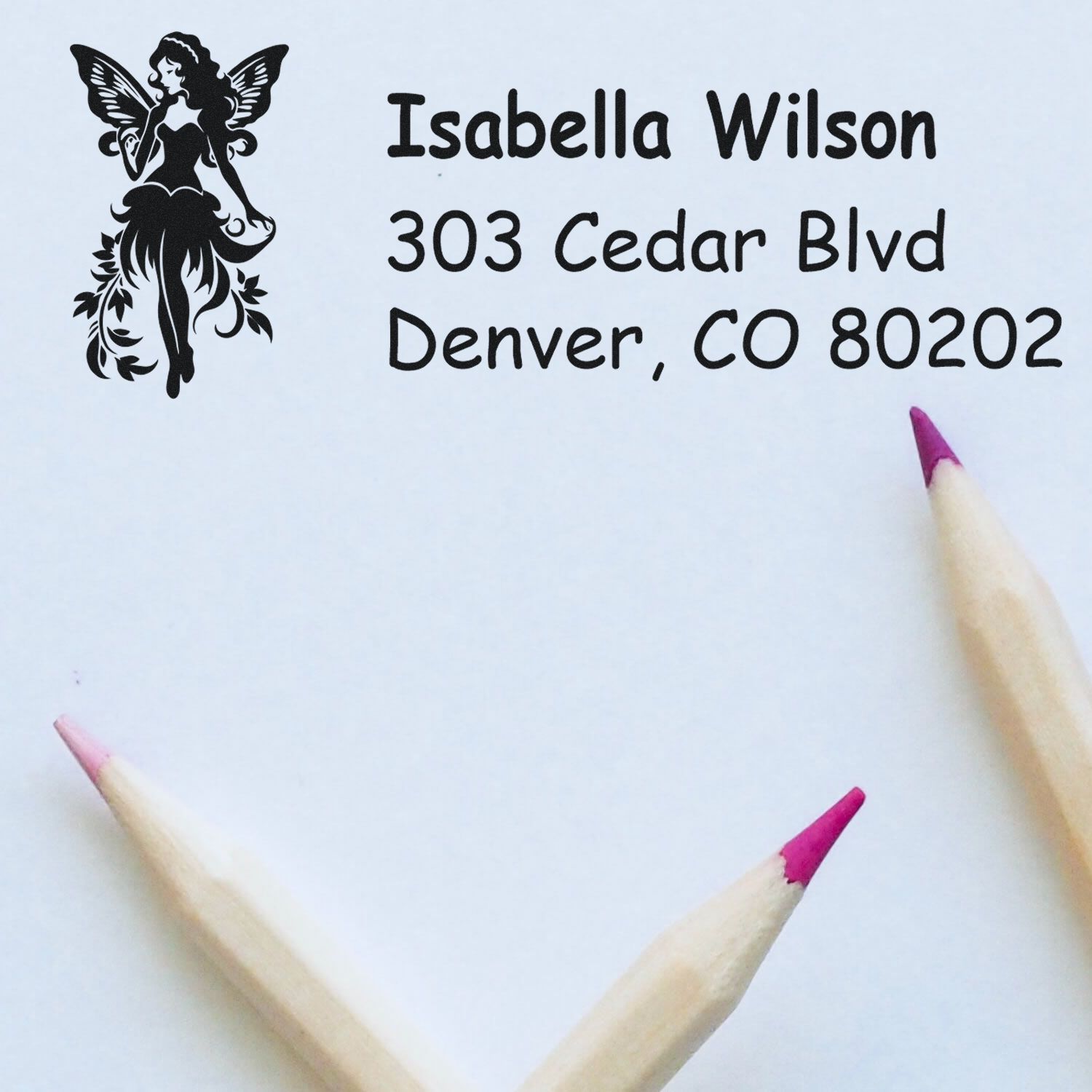Personalized return address rubber stamp with fairy design for Isabella Wilson, Denver CO 80202