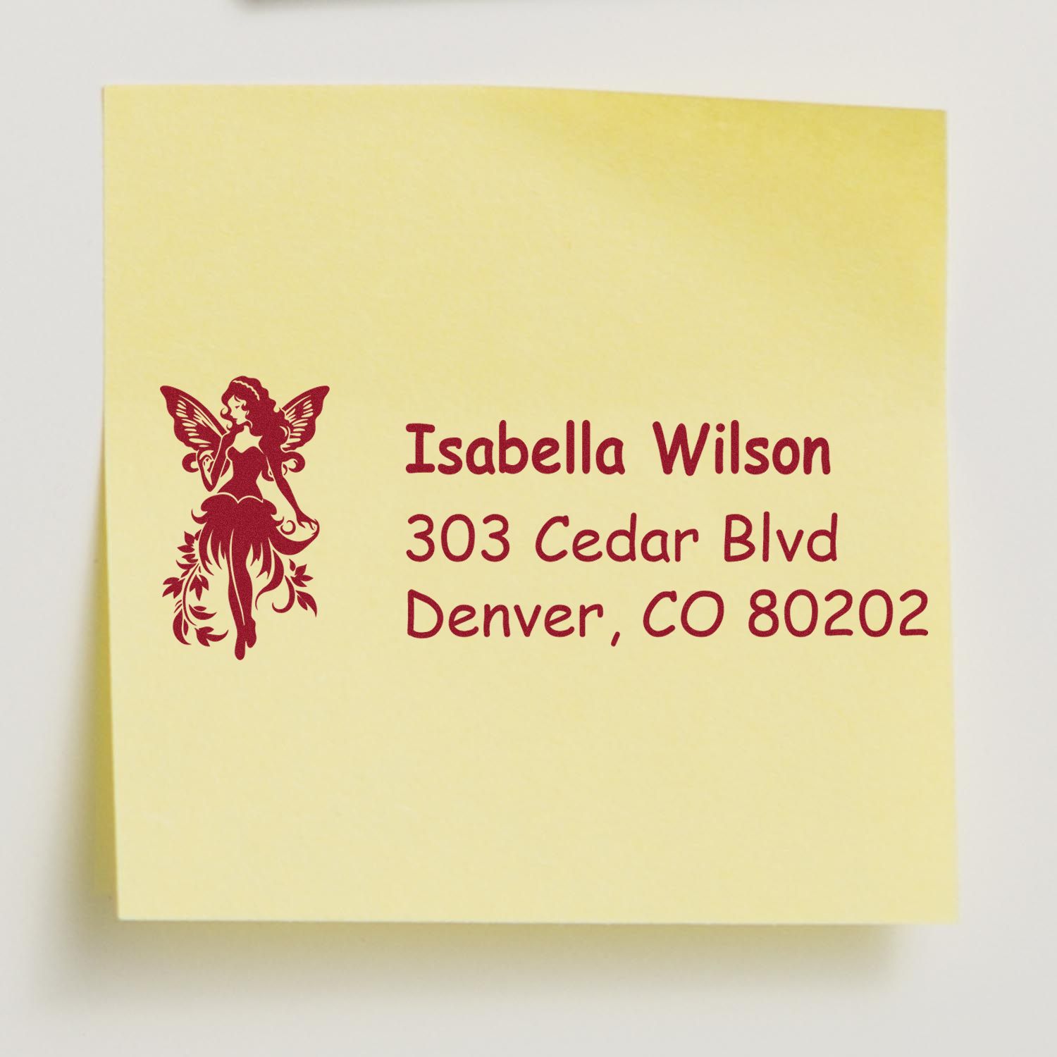 Custom fairy address rubber stamp for Isabella Wilson, 303 Cedar Blvd, Denver, CO 80202.