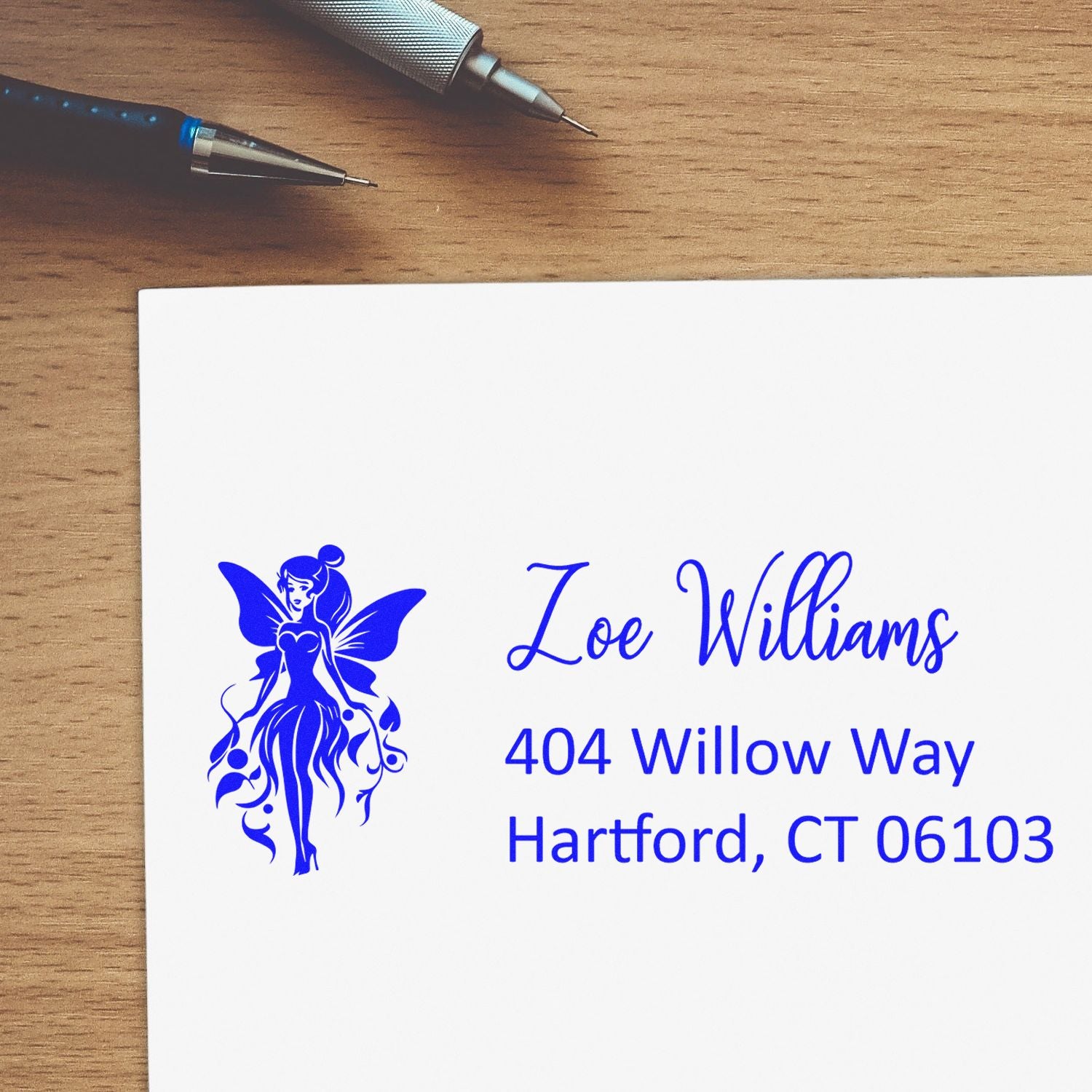 Personalized return address rubber stamp with fairy logo for Zoe Williams, Hartford, CT.