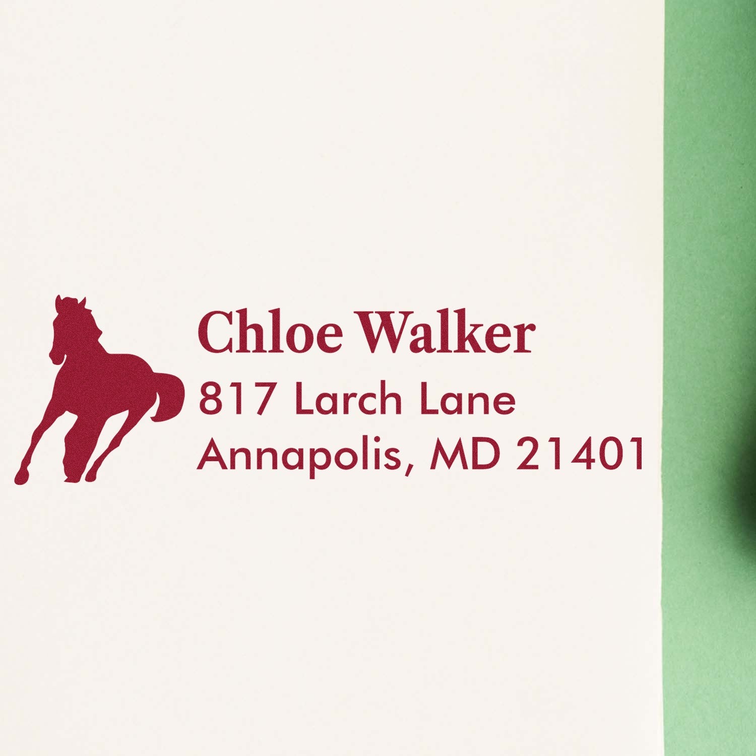 Custom horse return address rubber stamp with Chloe Walker name and Annapolis, MD address in burgundy ink.