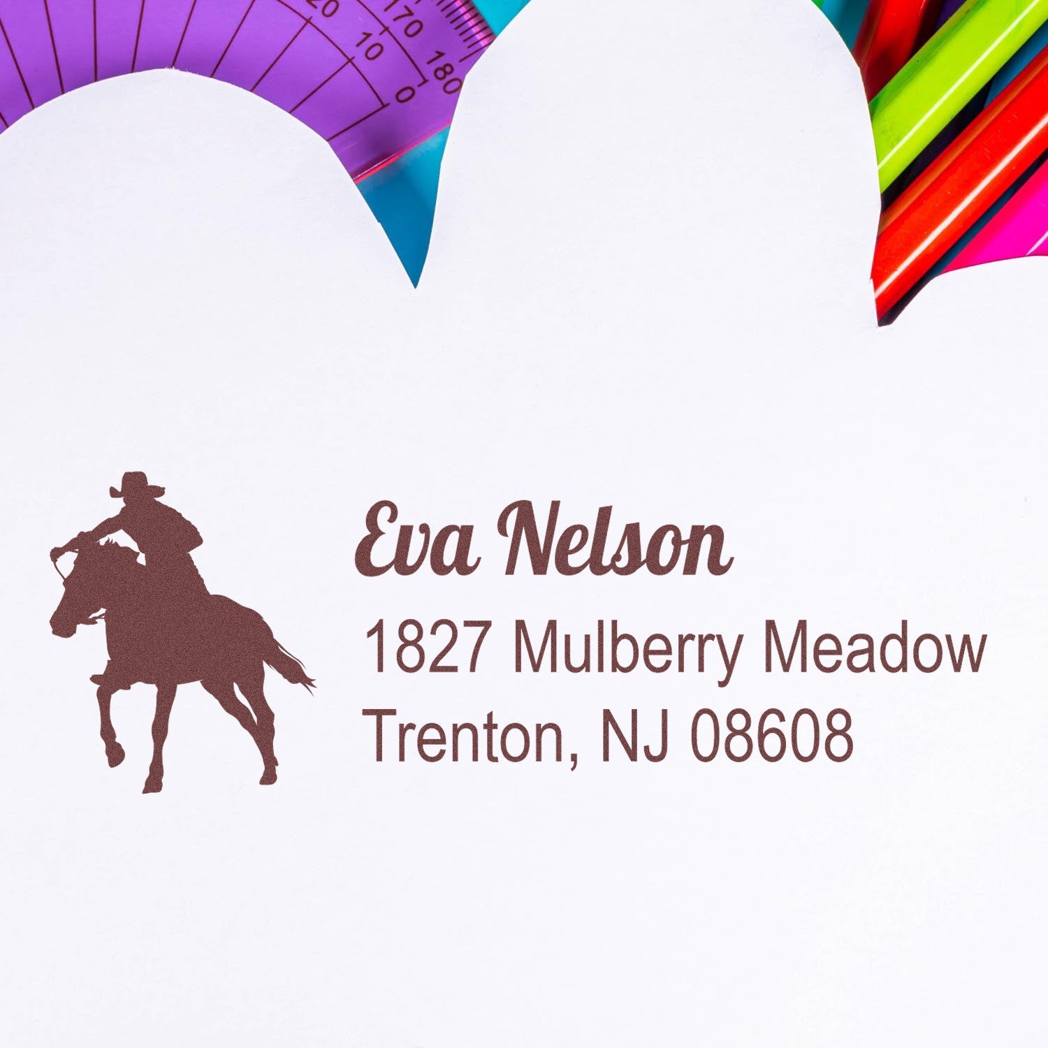 Custom horse rider return address rubber stamp with personalized name and Trenton, NJ address on white paper.
