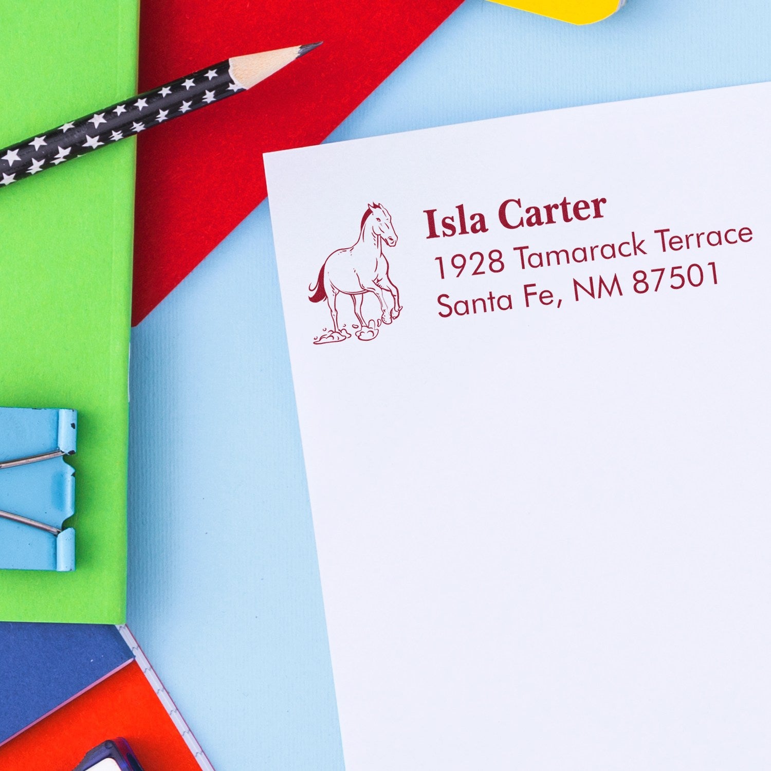 Custom horse return address rubber stamp on white envelope for personalized stationery and mailing.