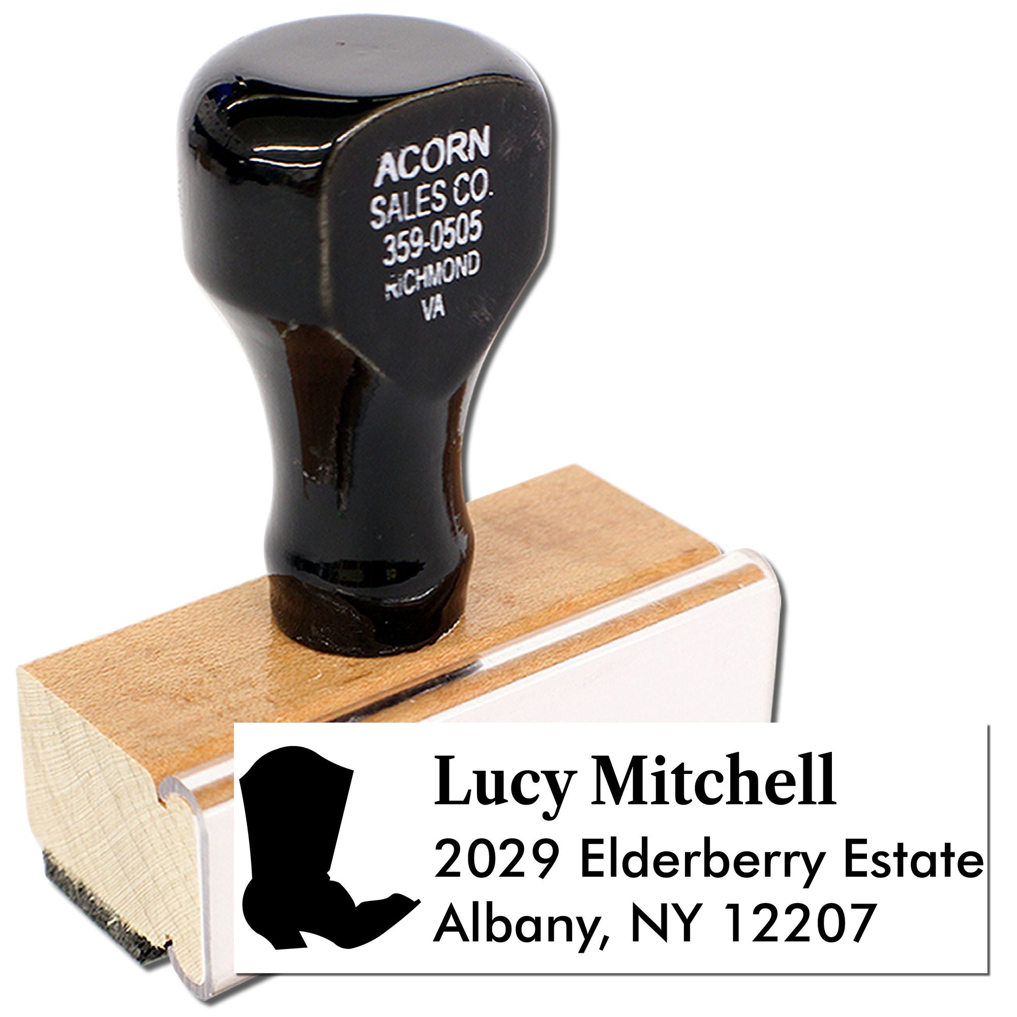Custom return address rubber stamp with wooden mount, featuring Lucy Mitchells name and Albany, NY address.